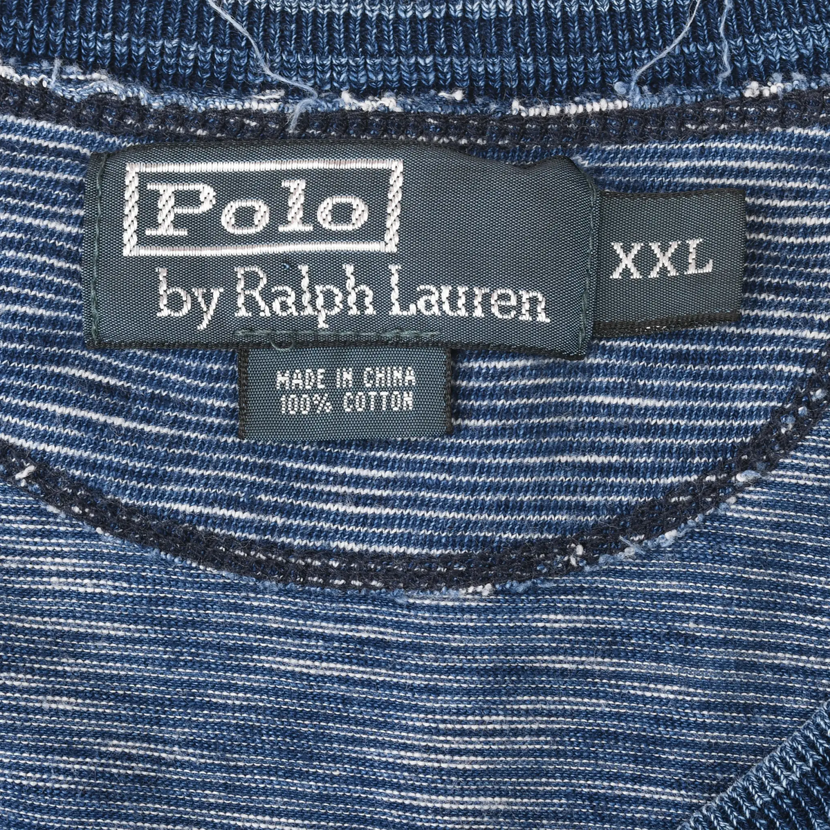 Polo by Ralph Lauren XXL neck label on blue striped fabric