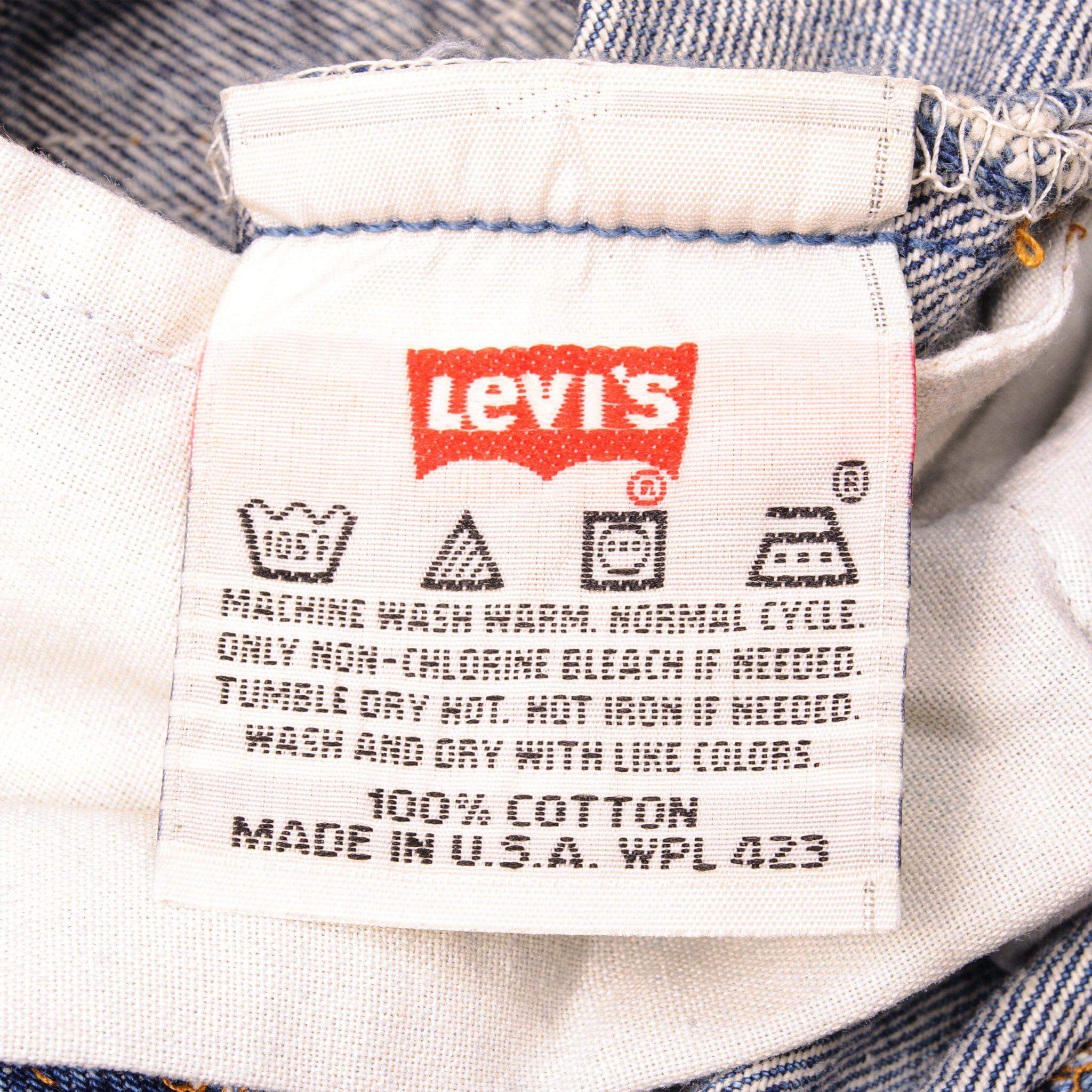 Beautiful Indigo Levis 501 Jeans Made in USA with a medium blue wash. Size on Tag 28X30 ACTUAL SIZE 28X30 Back Button #544