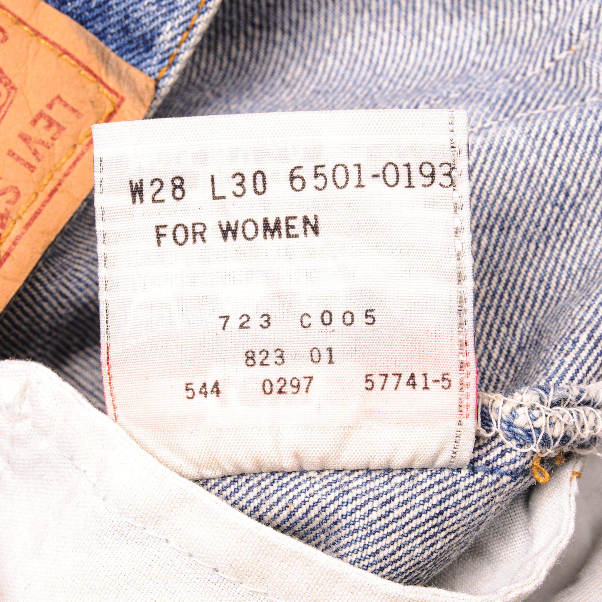 Beautiful Indigo Levis 501 Jeans Made in USA with a medium blue wash. Size on Tag 28X30 ACTUAL SIZE 28X30 Back Button #544