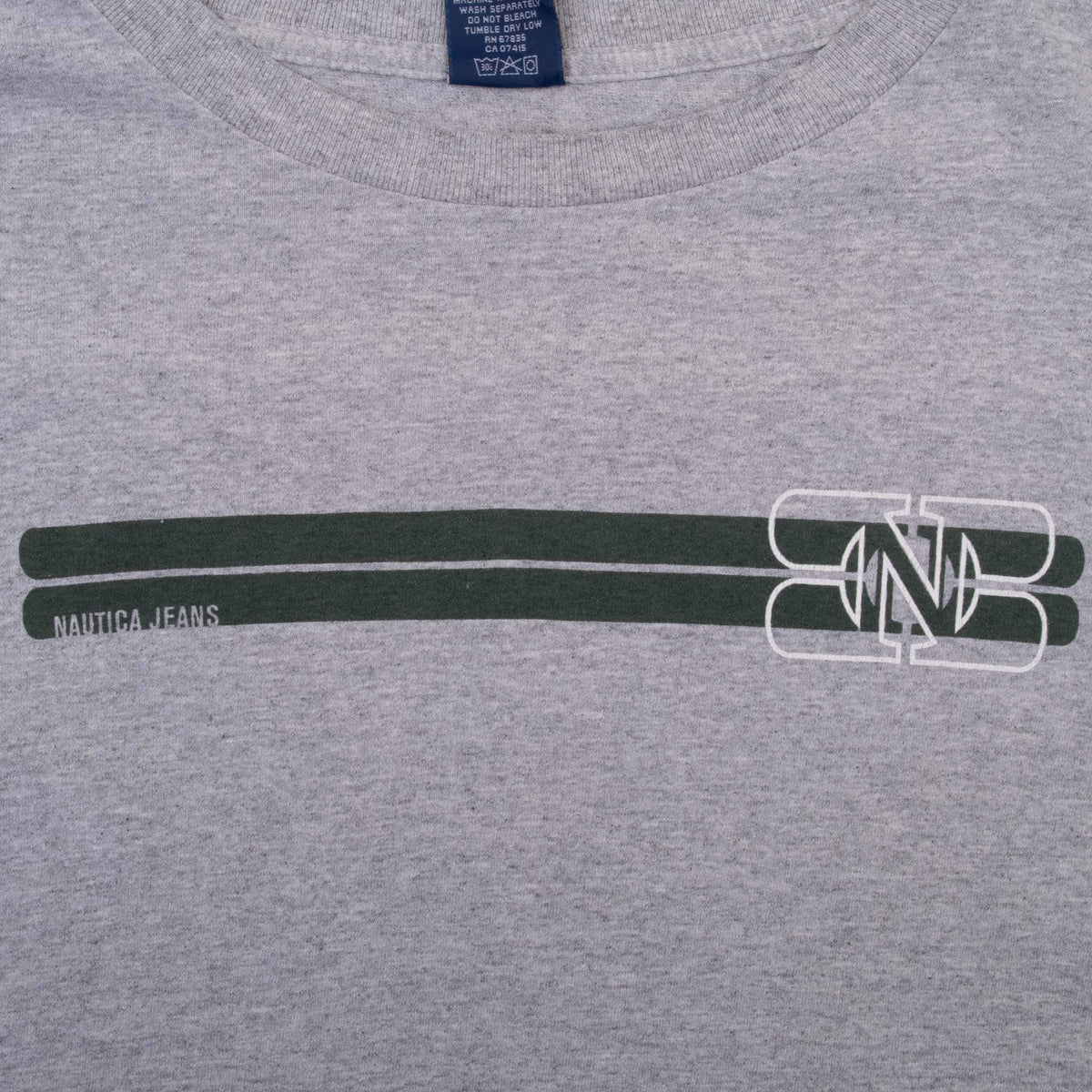 Close-up of Nautica Jeans chest graphic on grey long-sleeve T-shirt