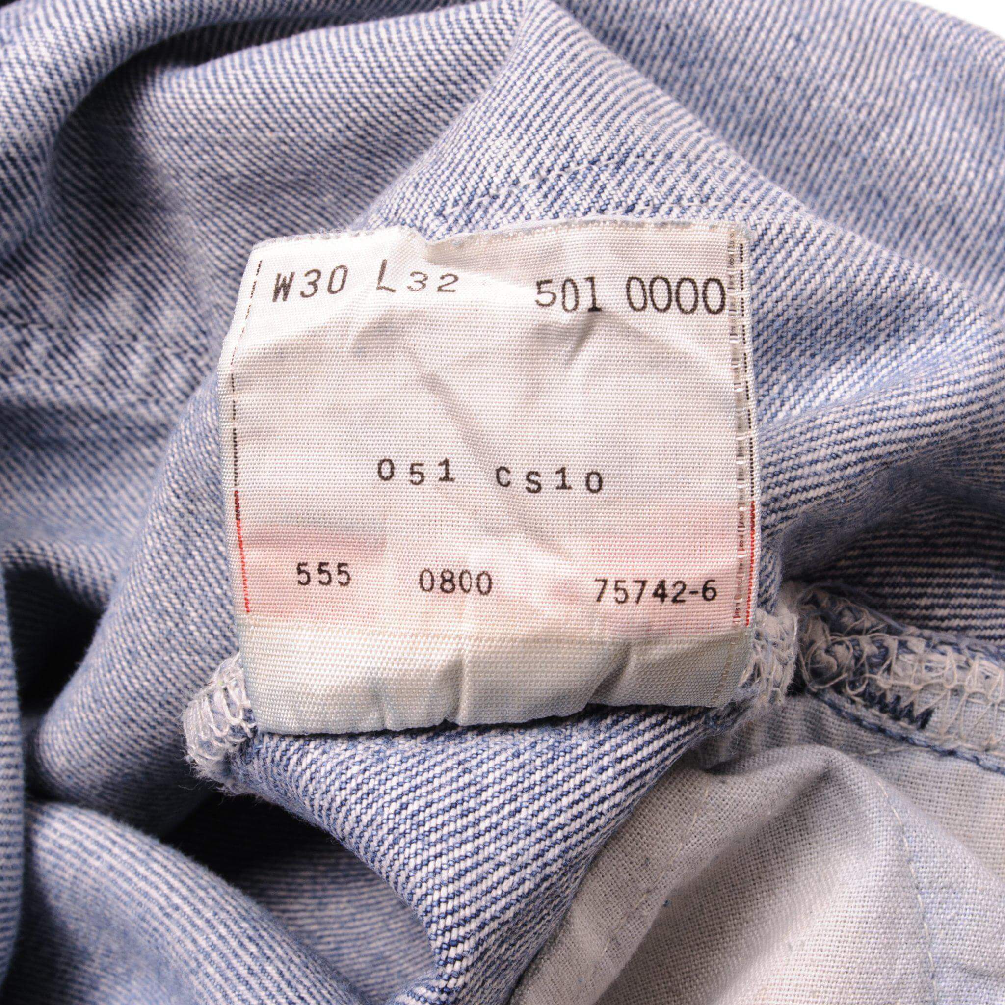 Beautiful Indigo Levis 501 Jeans 1990s Made in USA with a light blue wash and some nice light whiskers. Size on Tag 30X32 ACTUAL SIZE 28X28 Back Button #555