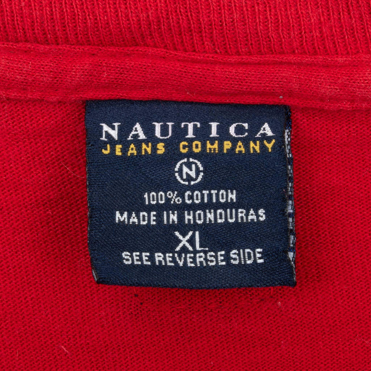 Nautica Jeans Company neck label showing XL and 100% cotton