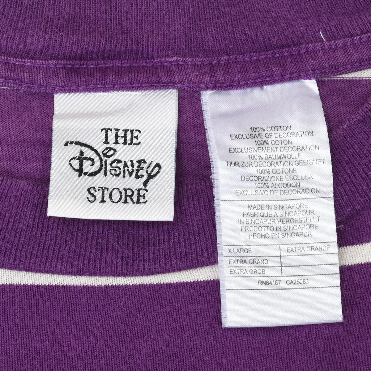 The Disney Store neck and care labels inside purple striped tee, marked X Large