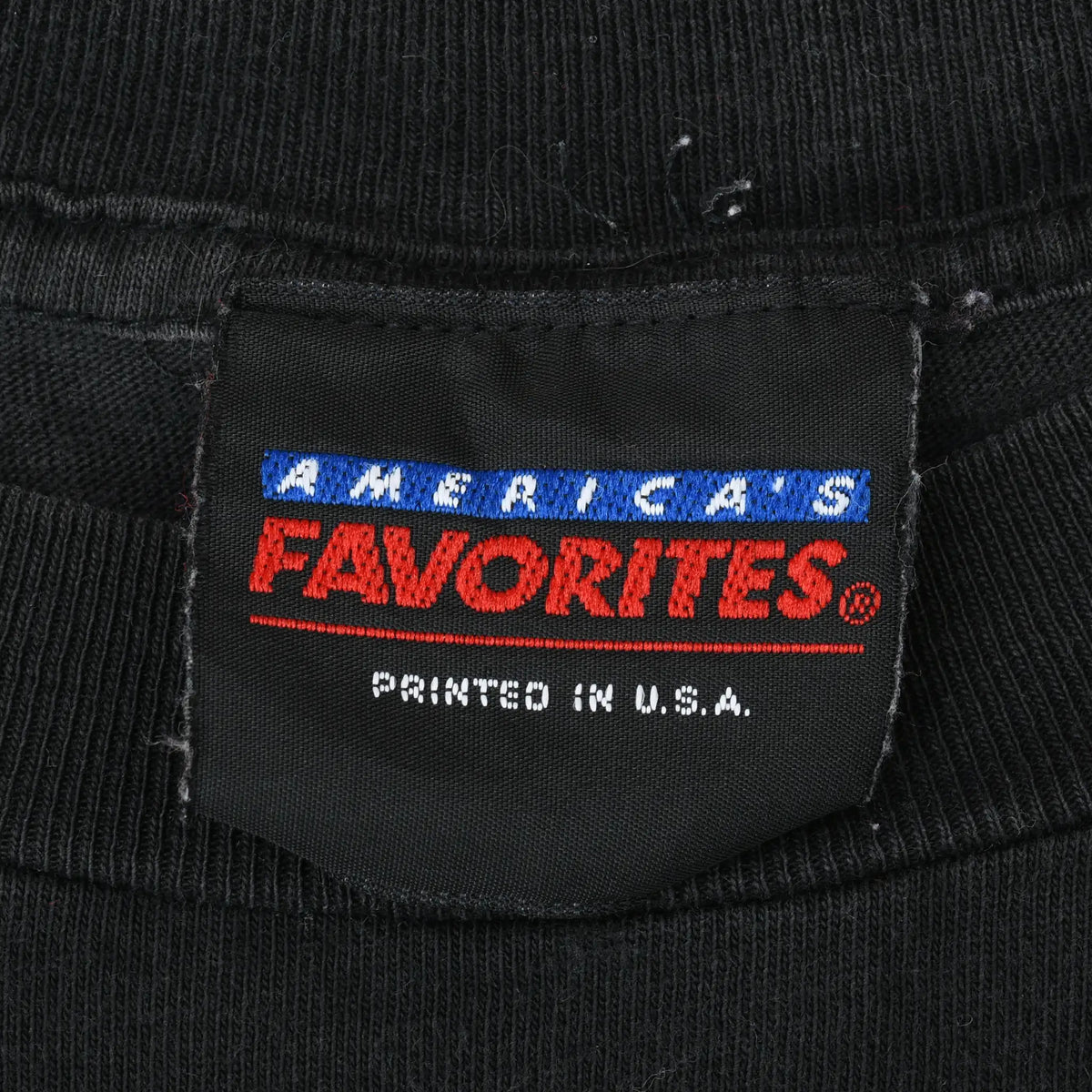 America's Favorites neck label on black Chicago Bulls T-shirt