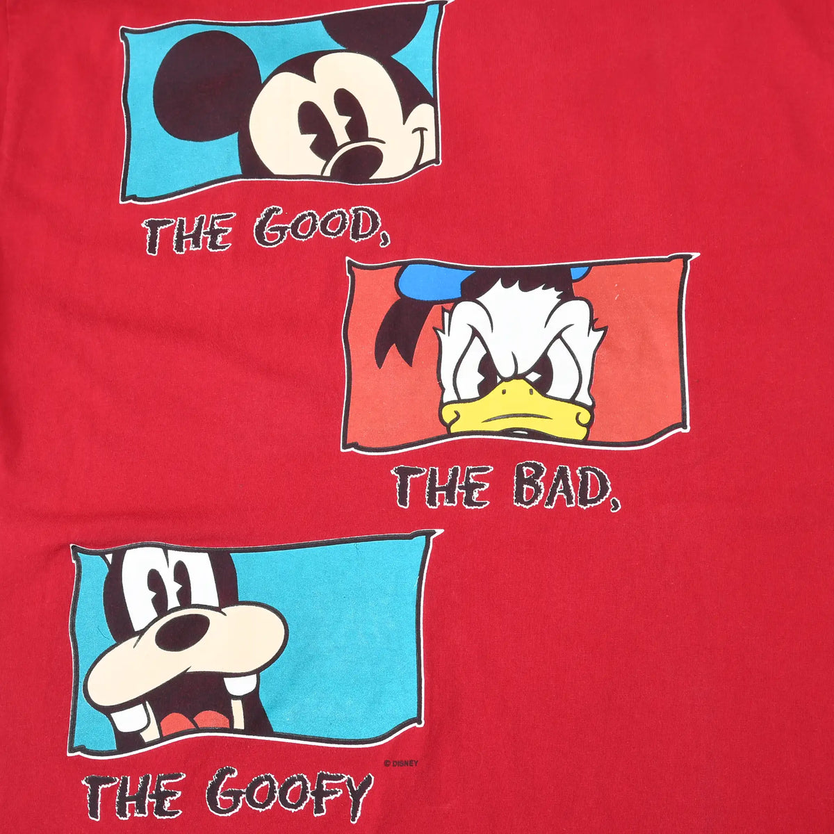 Close-up of Mickey, Donald and Goofy print reading The Good, The Bad, The Goofy