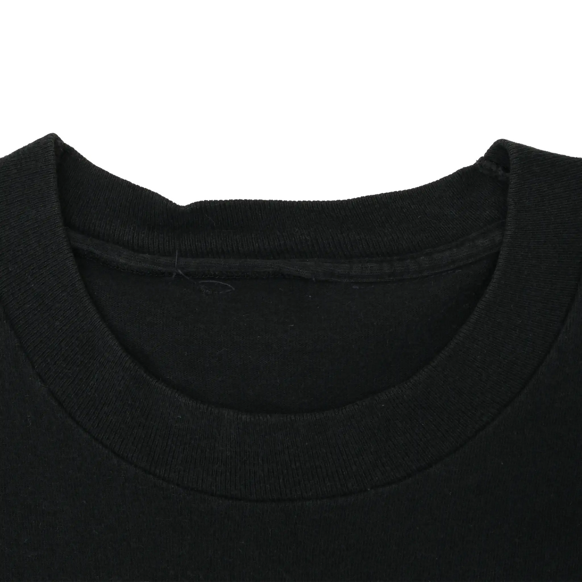 Close-up of the black ribbed crew neck and tagless inner collar