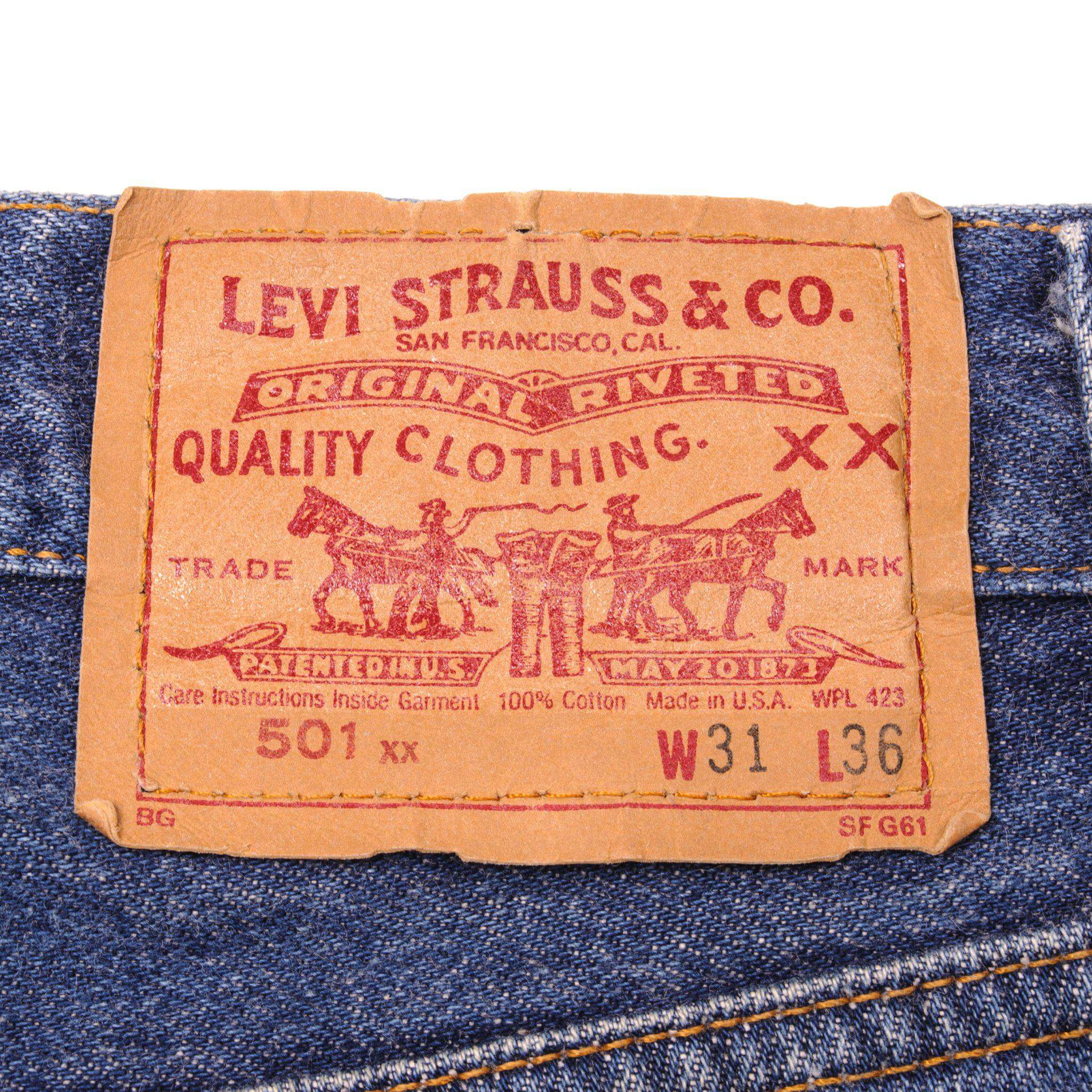 Beautiful Indigo Levis 501 Jeans 1988-1993 Made in USA with a dark blue wash and some nice whiskers. Size on Tag 31X36 ACTUAL SIZE 30X32 Back Button #552