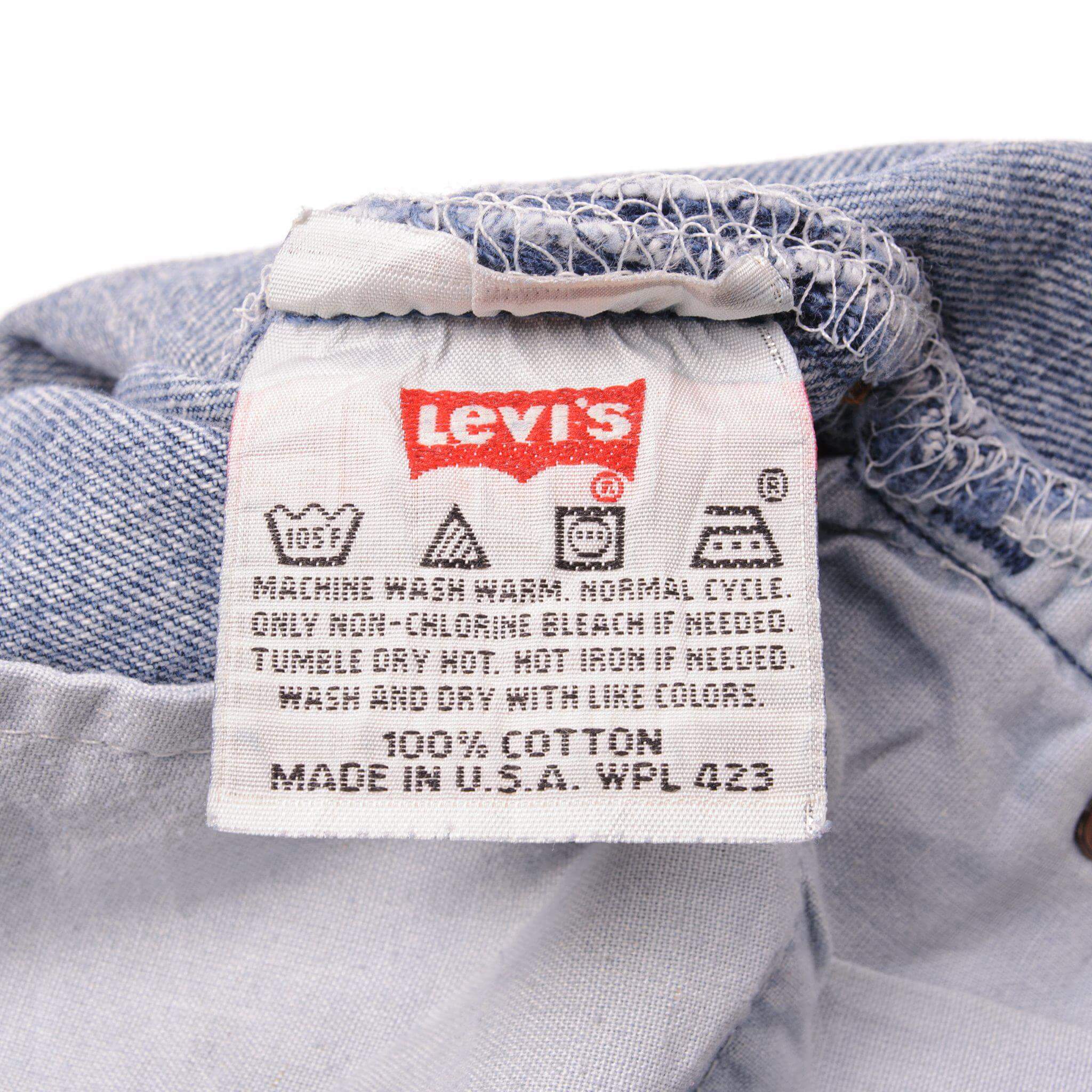 Beautiful Indigo Levis 501 Jeans 1990s Made in USA with a medium blue wash and a nice contrast of light and medium blue. Size on Tag 31X32 ACTUAL SIZE 31X31 Back Button #544