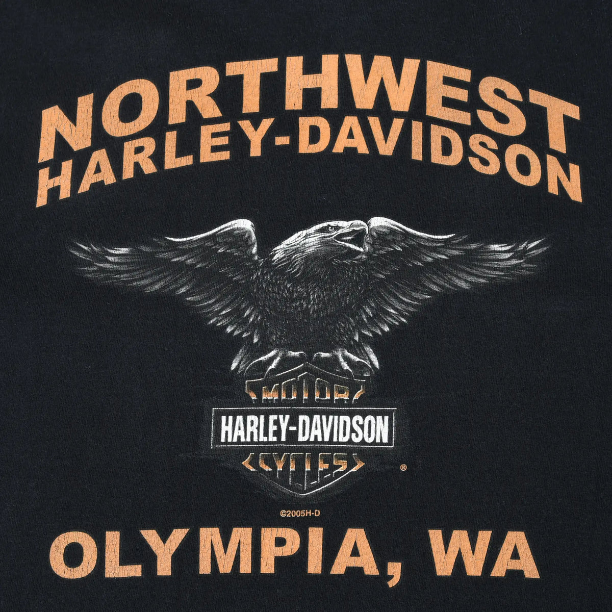Back print detail with Northwest Harley-Davidson eagle graphic and Olympia, WA text