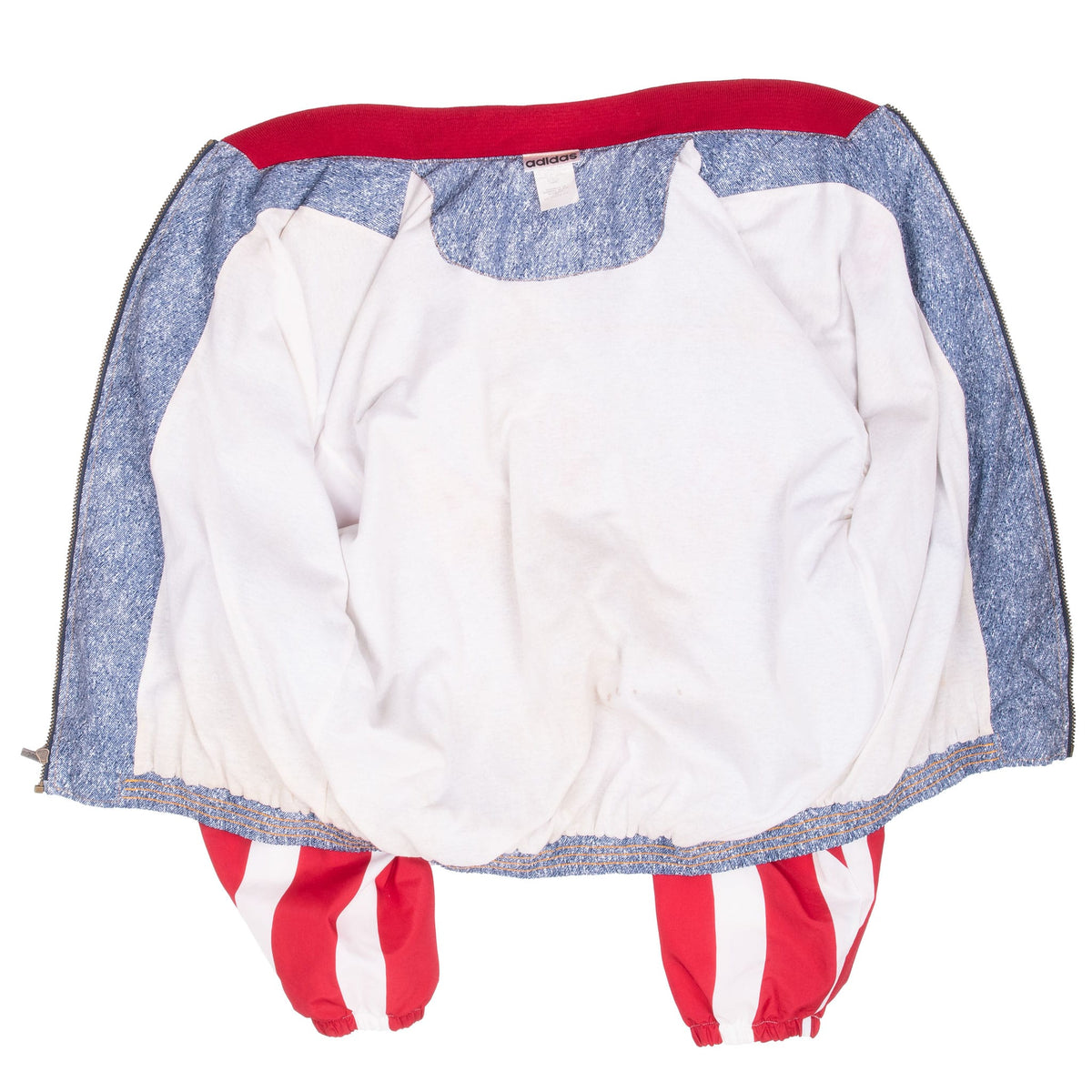 Inside view of adidas Team USA windbreaker showing white lining and interior seams
