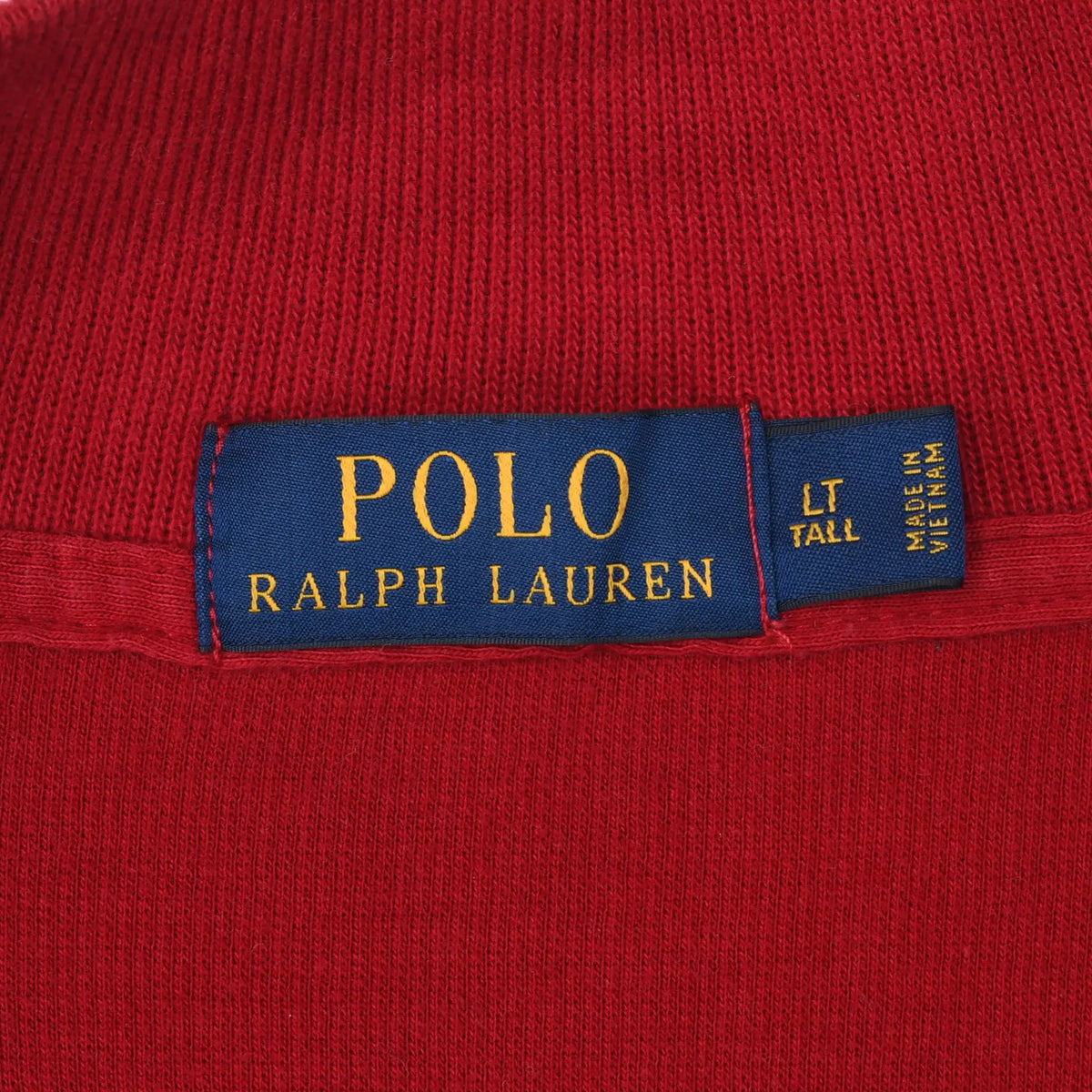 Polo Ralph Lauren neck label marked LT Tall and made in Vietnam on red knit fabric