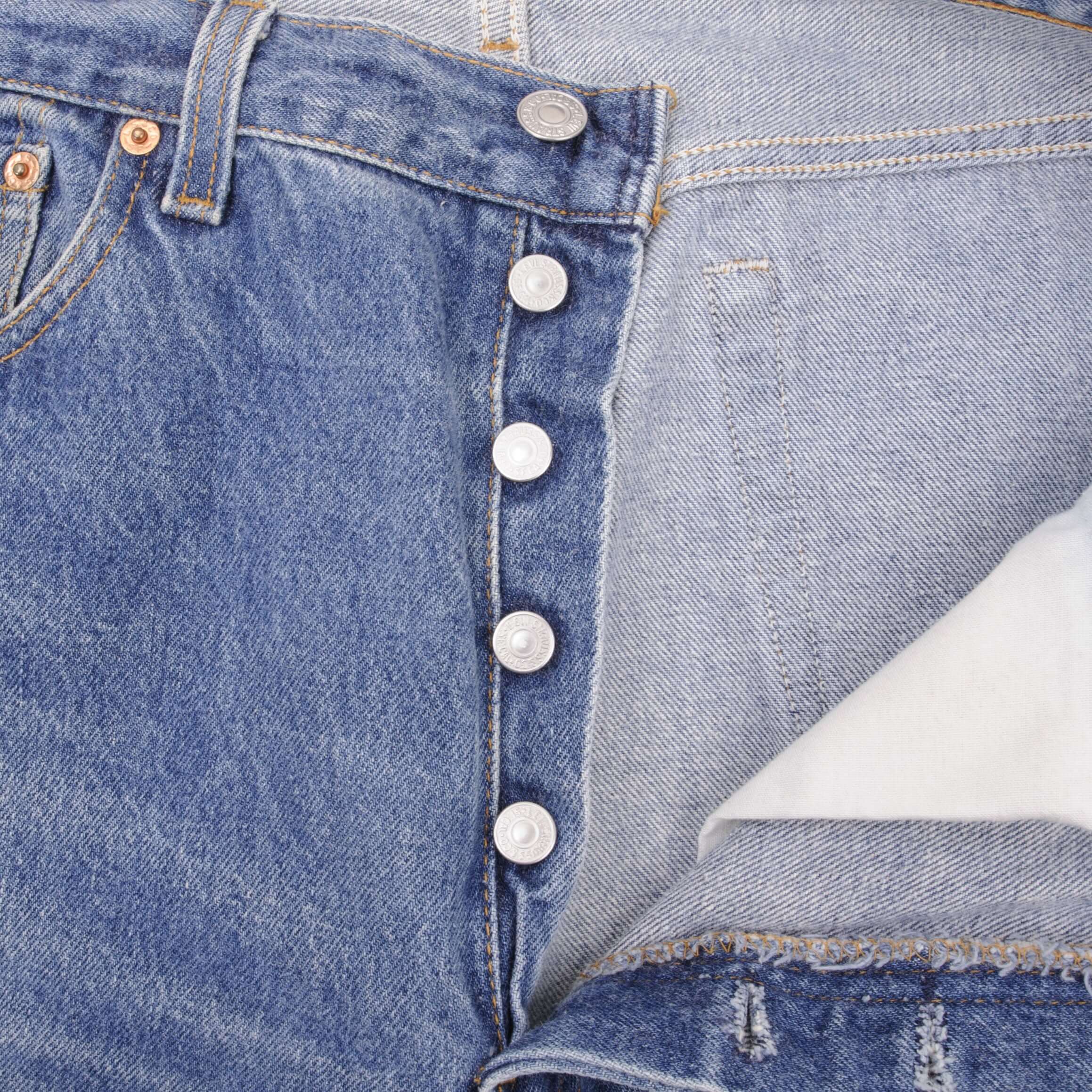 Beautiful Indigo Levis 501 Jeans 1990s Made in USA with Medium Light Wash With Light Whiskers Size on tag 36X36 Actual Size 34X33 Back Button #552