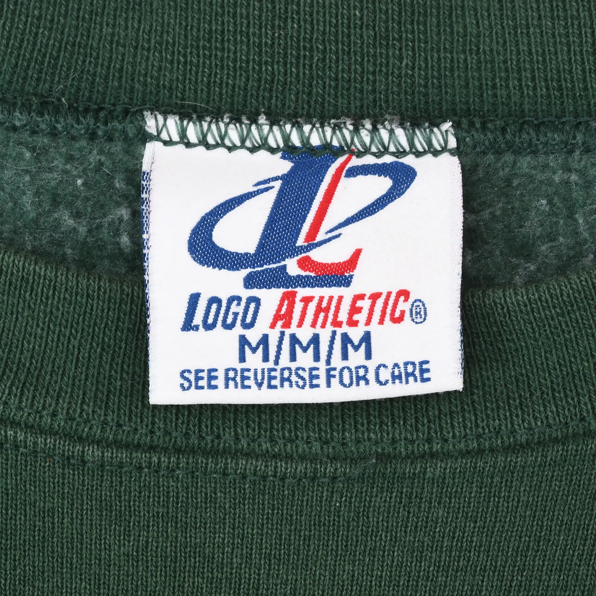 Logo Athletic M/M neck tag with reverse care instruction inside green sweatshirt