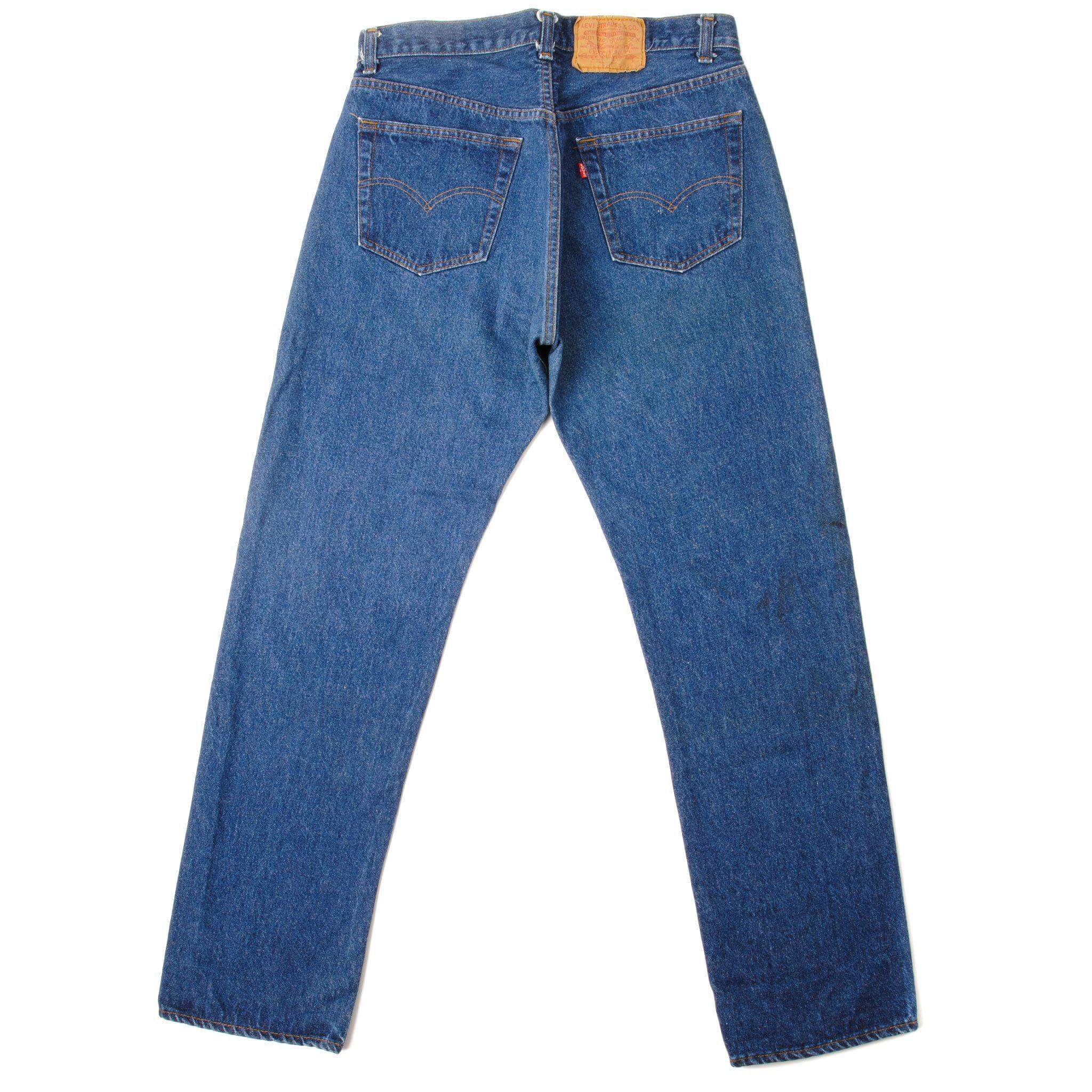 Beautiful Indigo Levis 501 Jeans from 1970 to 1985 Made in USA with a perfect medium blue wash. Size 32x30 Back Button #653