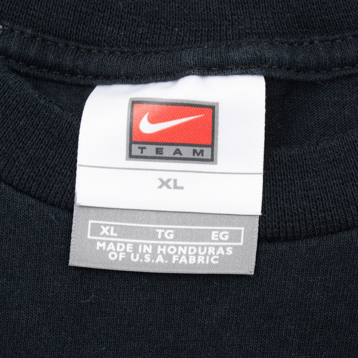 Nike Team neck label marked XL on black T-shirt
