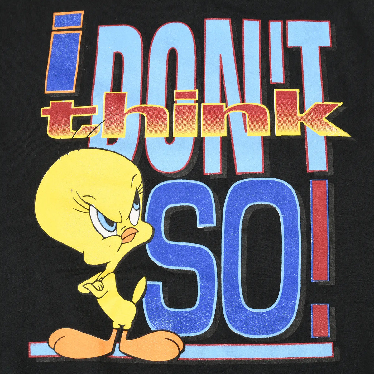 Close-up of Tweety and colorful I Don't Think So chest graphic on black fabric
