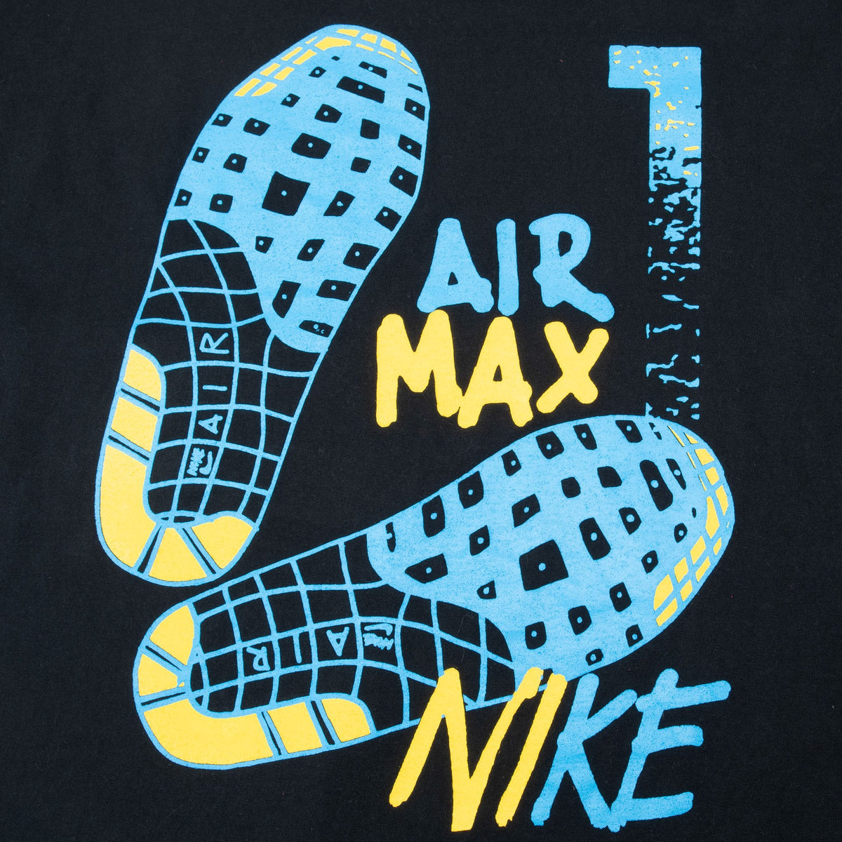 Close-up of blue and yellow Nike Air Max shoe-sole and number 1 back print