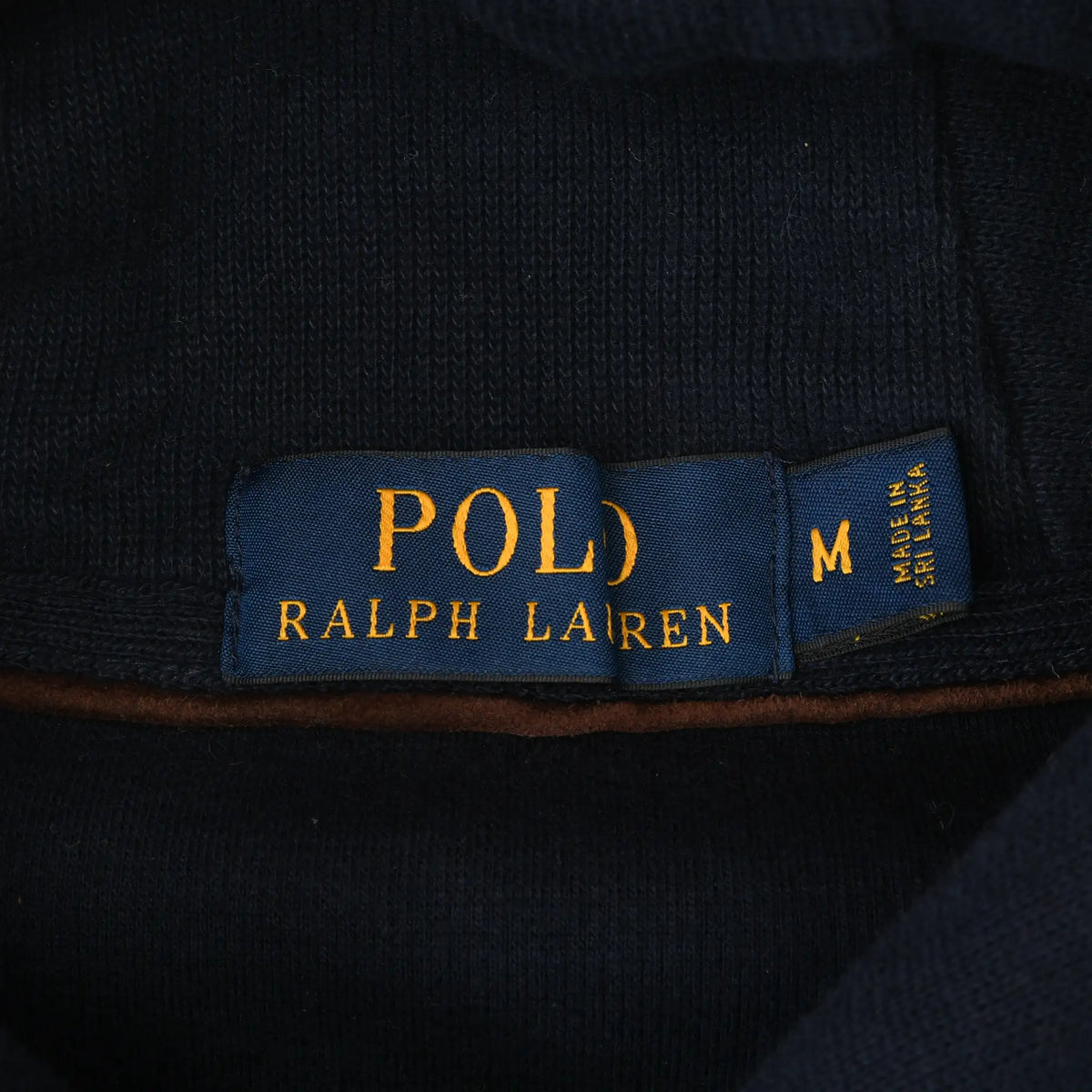 Polo Ralph Lauren neck label and medium size tag inside navy sweater