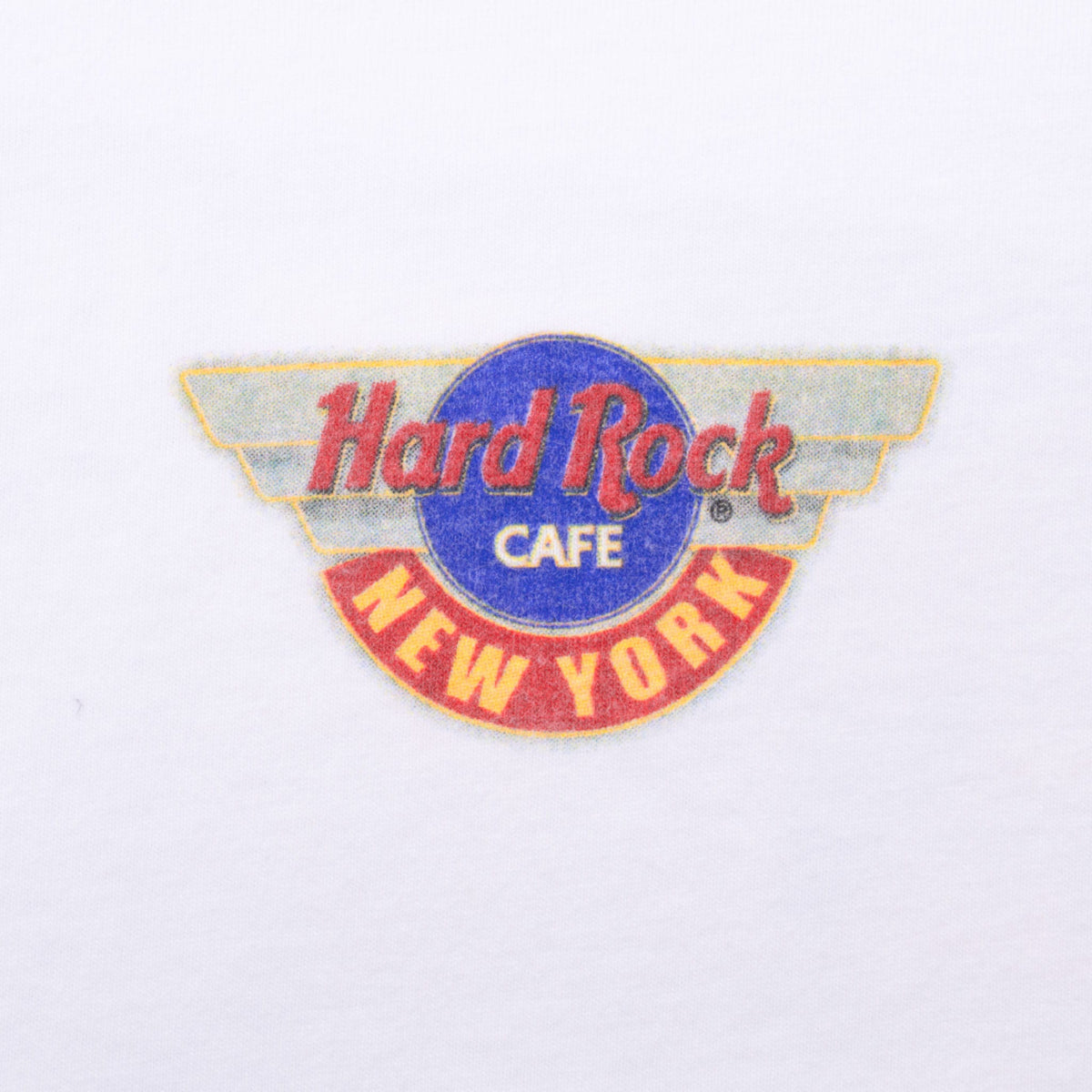 Close-up of multicolor Hard Rock Cafe New York logo printed on the front chest