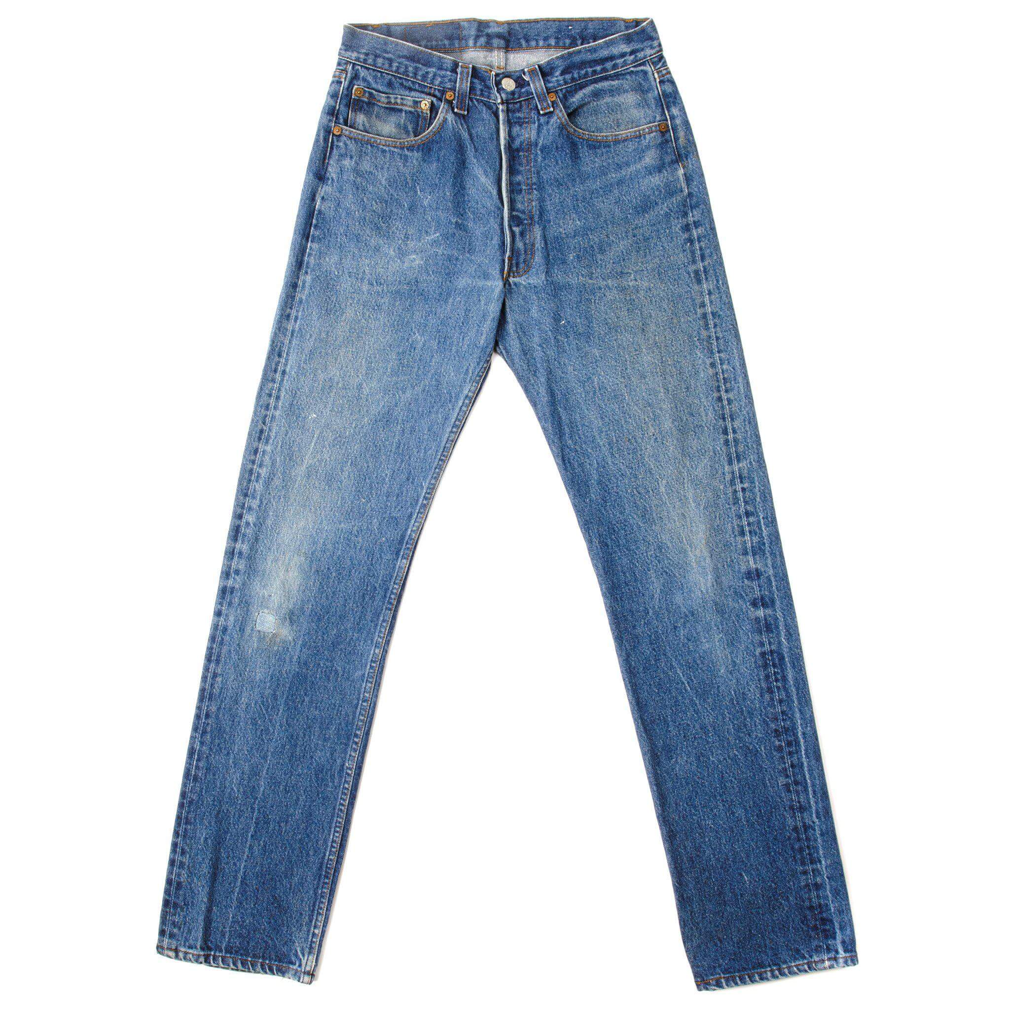 Beautiful Indigo Levis 501 Jeans from 1985 to 1988 Made in USA with a medium blue wash, a nice contrast of light and medium blue and some light whiskers. Size 30x32 Back Button #552