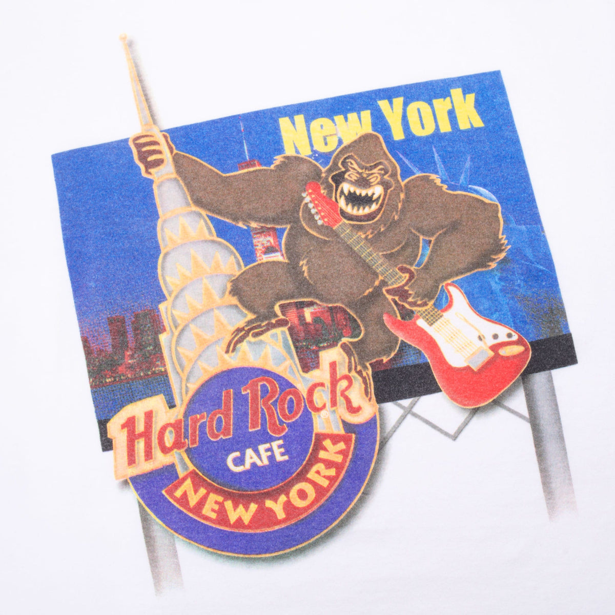 Close-up of back graphic showing King Kong with a guitar, skyline and Hard Rock Cafe New York logo