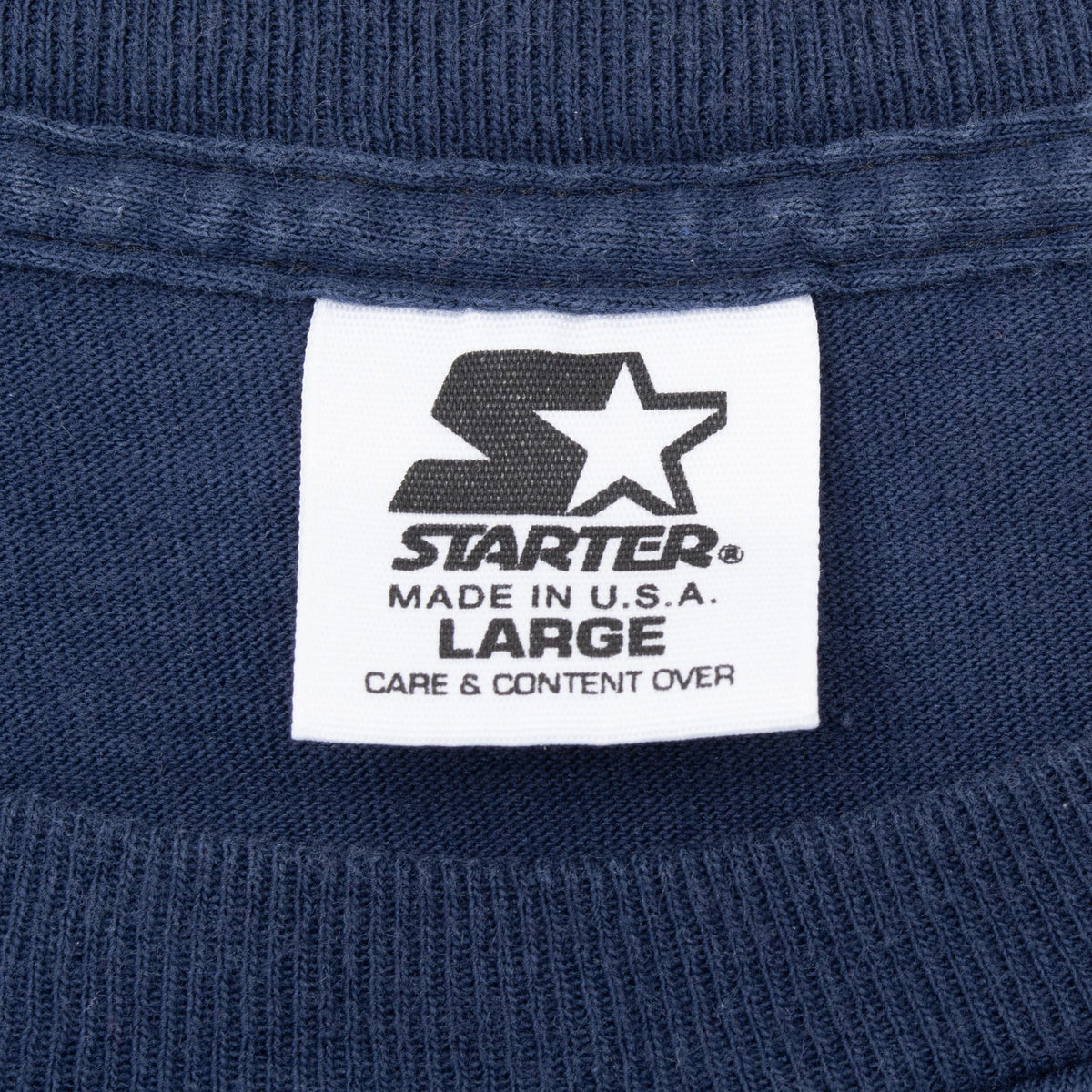 Starter neck tag marked Made in USA and size Large
