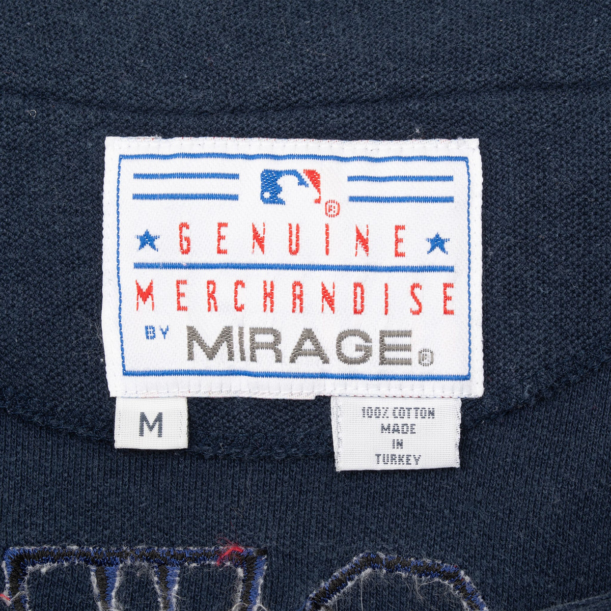 Mirage MLB Genuine Merchandise neck label and medium size tag on Cardinals jersey