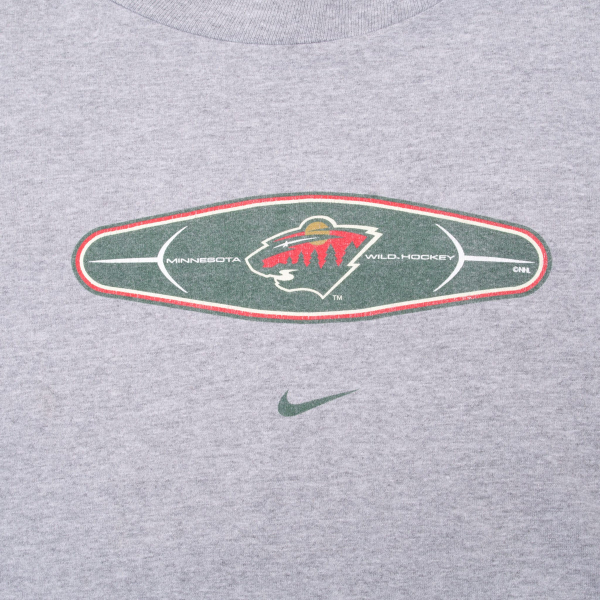 Minnesota Wild oval chest graphic with green Nike Swoosh on gray shirt