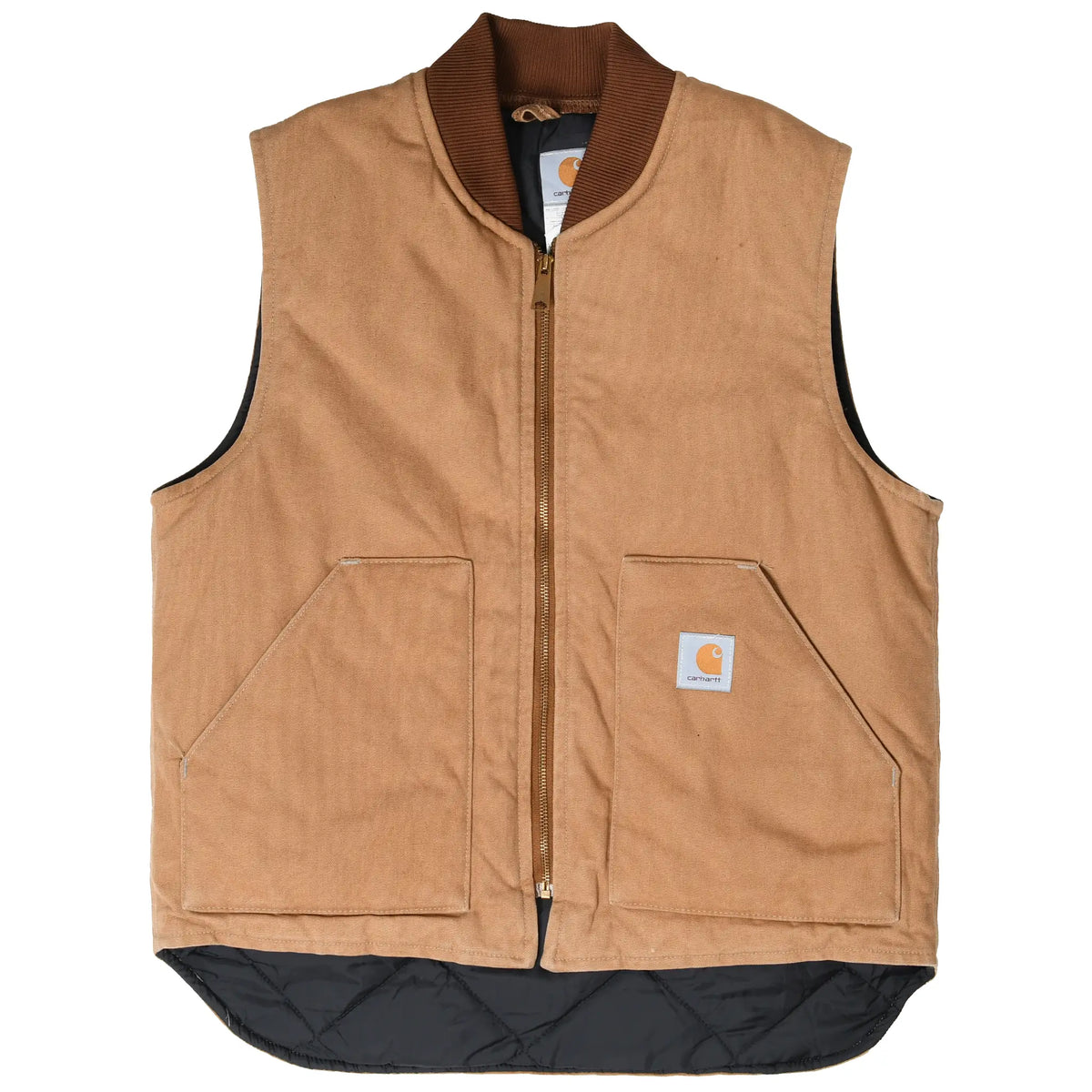 Front of brown Carhartt V01 vest showing brass zipper, patch pockets, and black quilted drop-tail lining