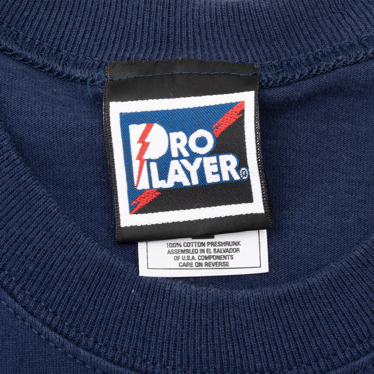 Pro Player neck label inside navy Washington Huskies T-shirt
