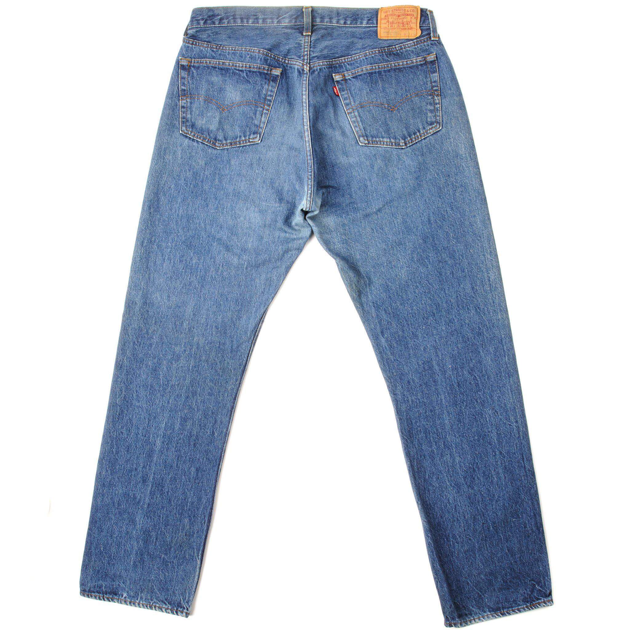 Beautiful Indigo Levis 501 Jeans from 1970 to 1985 Made in USA with a medium blue wash and a nice contrast of light and medium blue. Size 38x33 Back Button #524