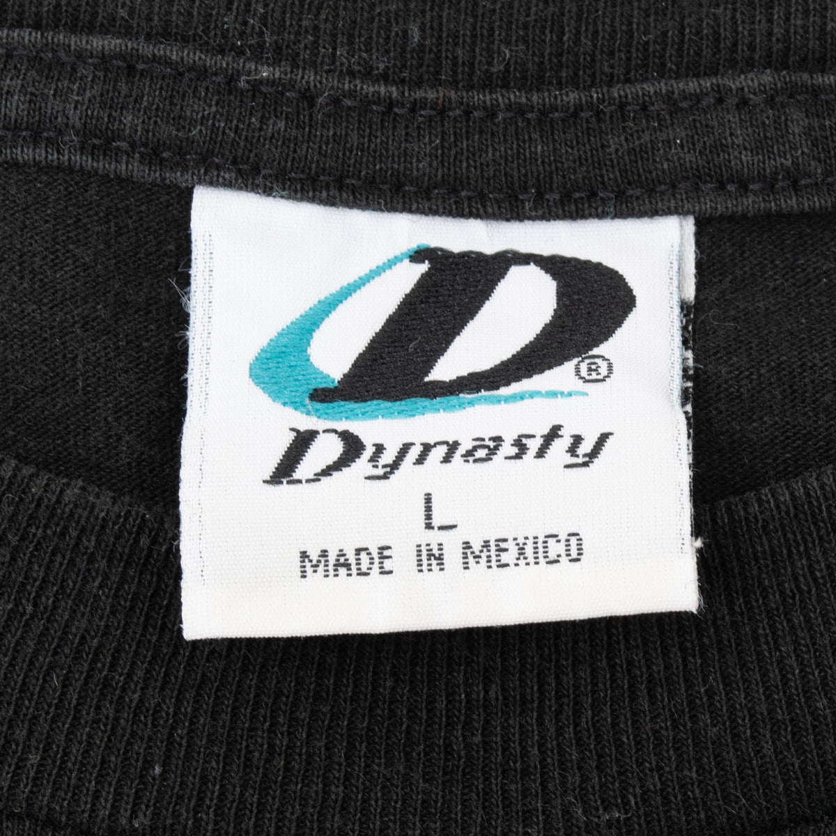 Dynasty size large neck tag on black St. Louis Cardinals T-shirt