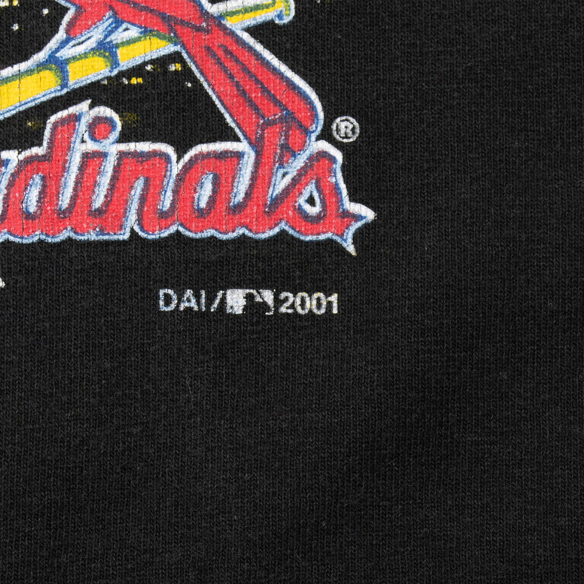 Close-up of 2001 date printed below the St. Louis Cardinals front graphic