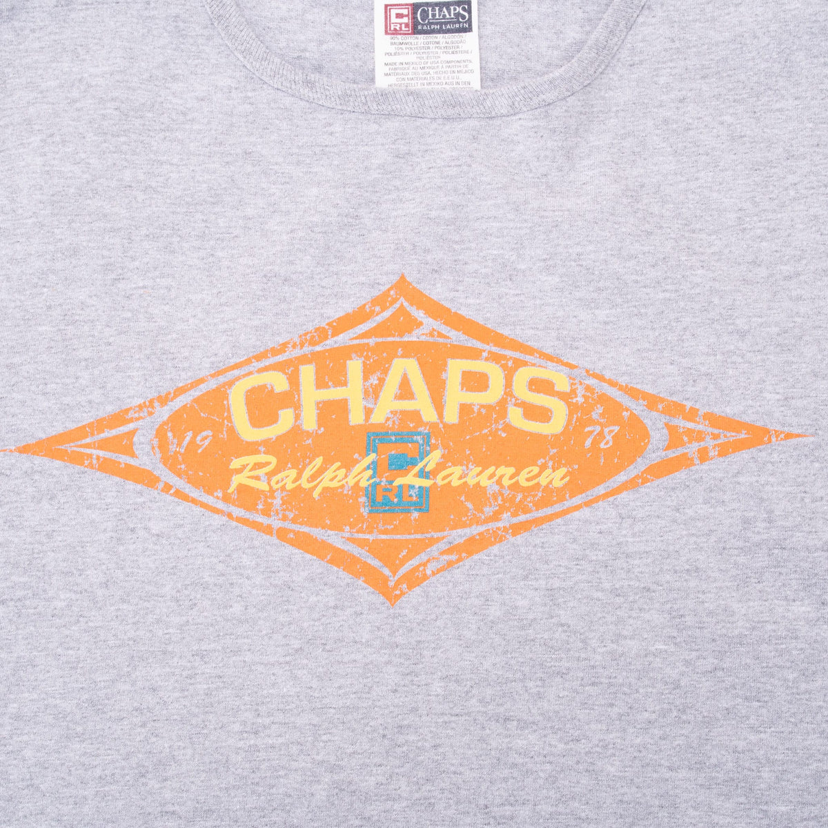 Close-up of orange Chaps Ralph Lauren diamond graphic with blue CRL logo