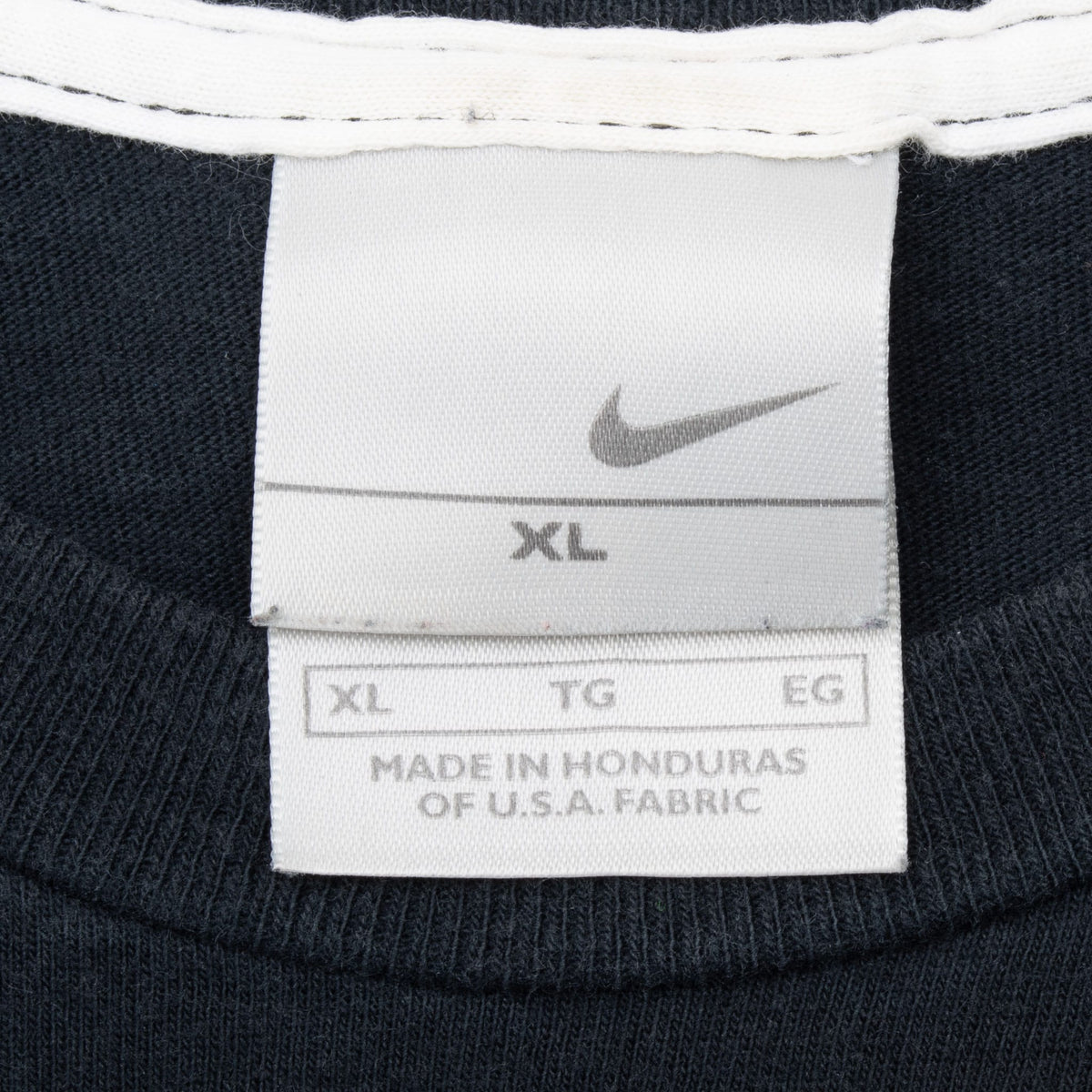 Nike neck tag marked XL and made in Honduras of U.S.A. fabric
