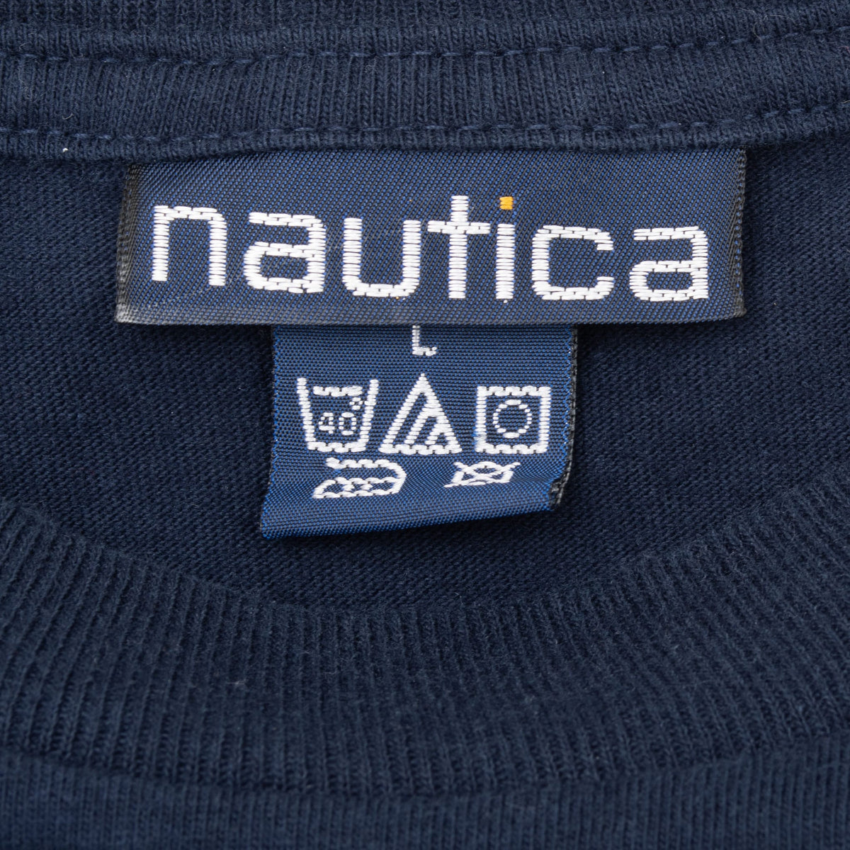 Nautica neck tag marked size L with care symbols