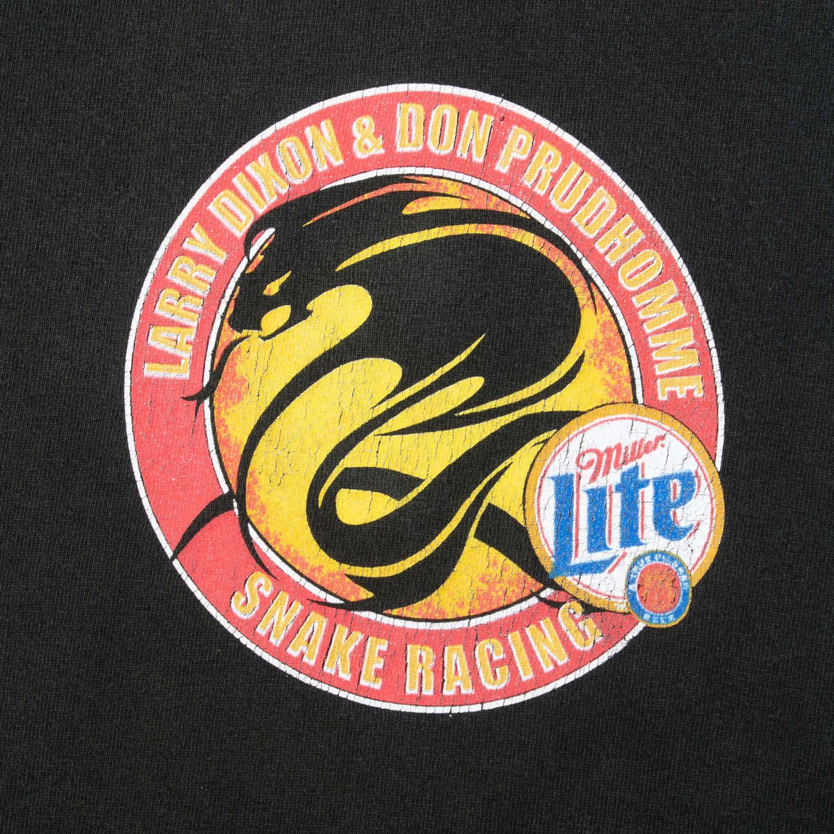 Close-up of Larry Dixon and Don Prudhomme Snake Racing chest print with Miller Lite logo