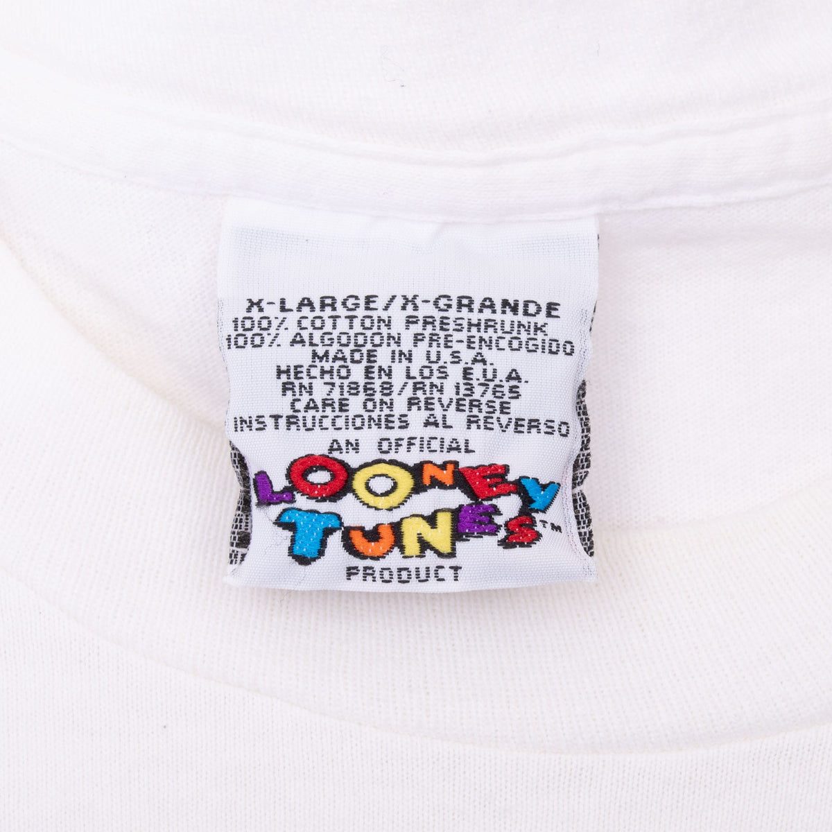 Looney Tunes neck tag marked X-Large and made in USA