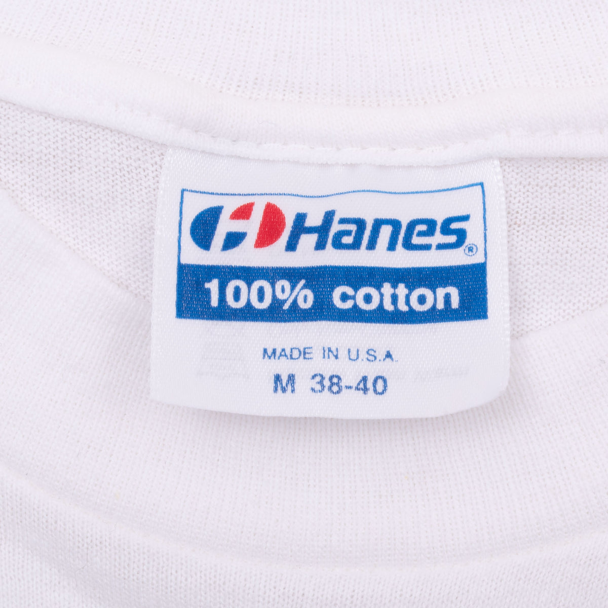 Hanes neck label reading 100% cotton, Made in U.S.A., M 38-40