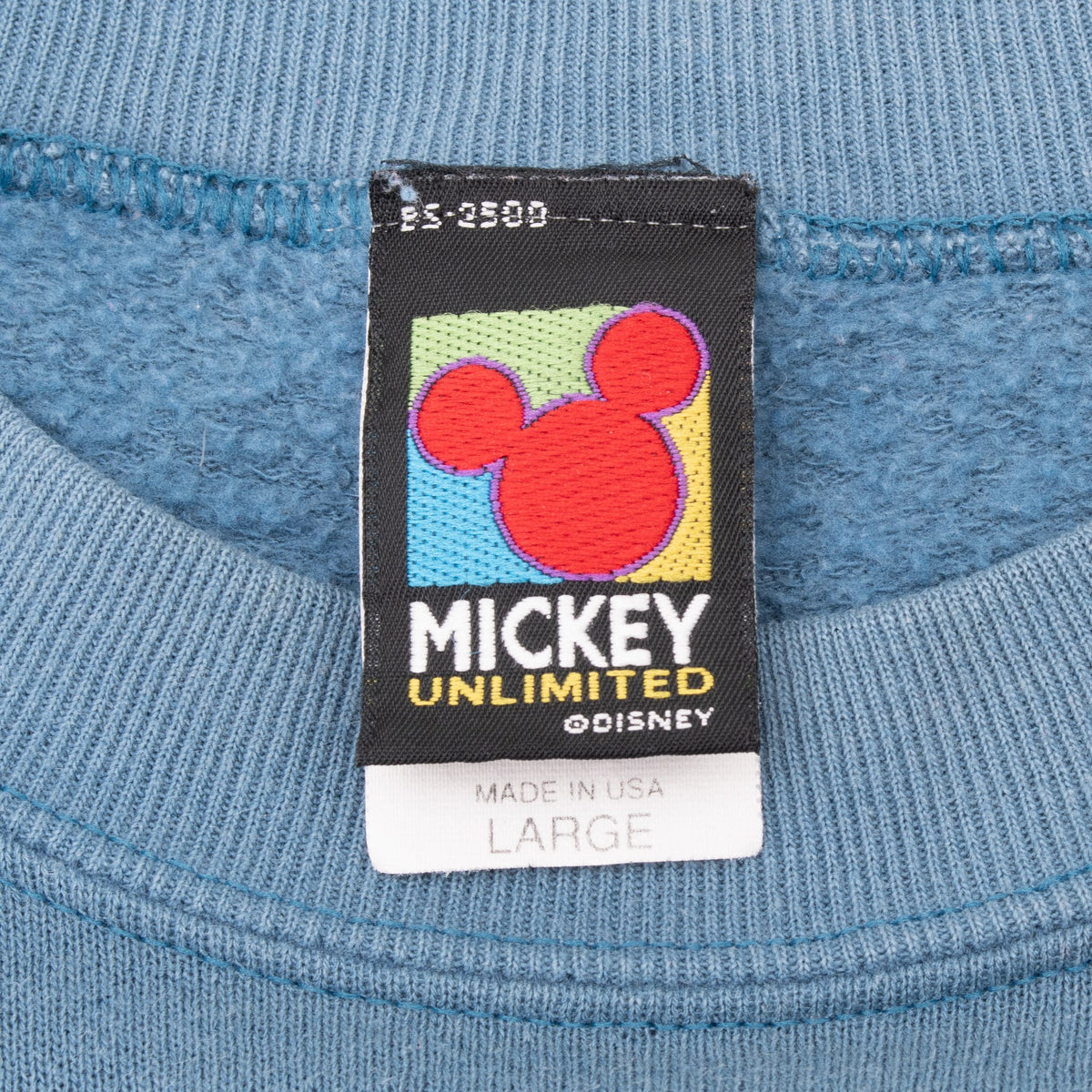 Mickey Unlimited Disney neck label marked large and made in USA