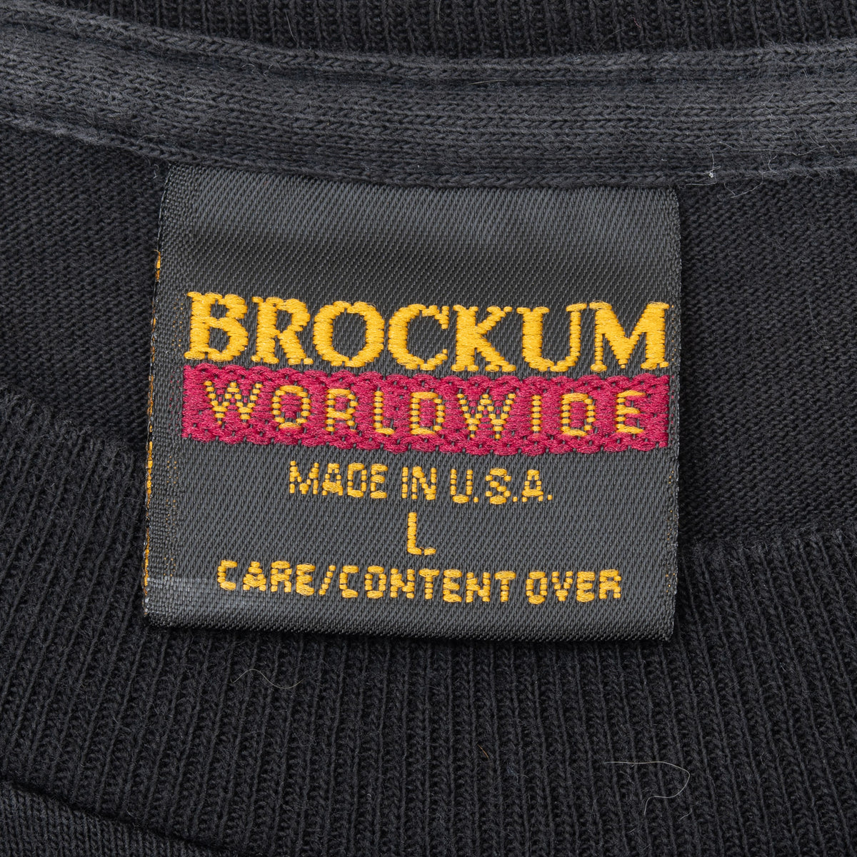 Brockum Worldwide neck label marked Made in U.S.A. and size L