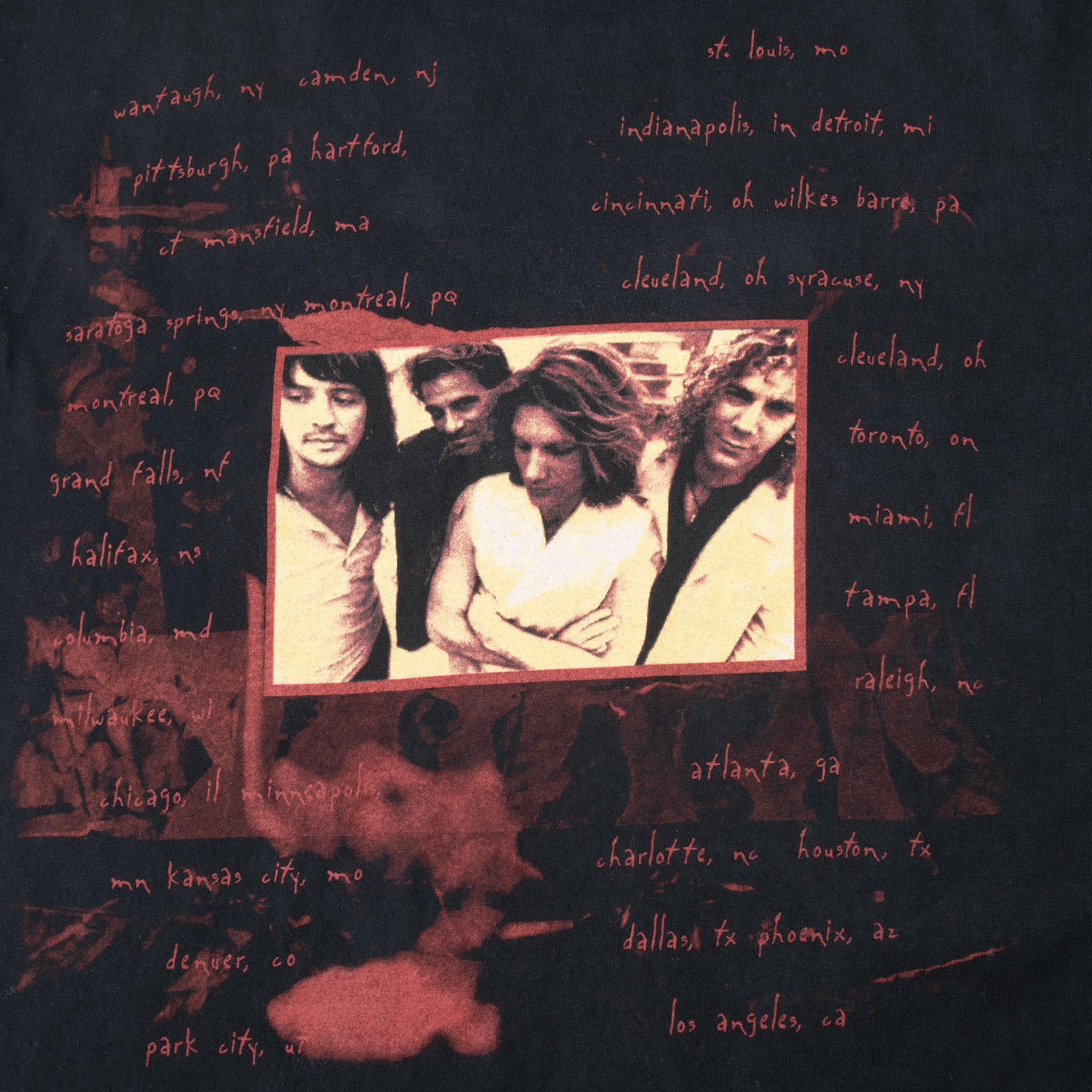 Close-up of back graphic with Bon Jovi band photo and handwritten tour city list