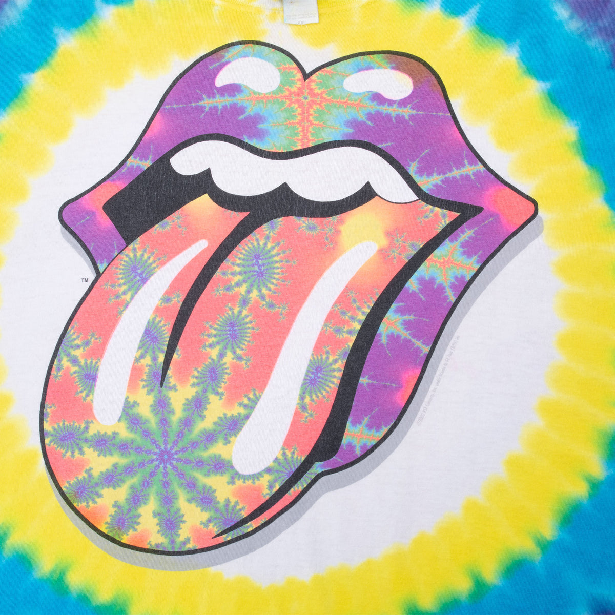 Close-up of multicolor Rolling Stones tongue graphic on tie-dye T-shirt front