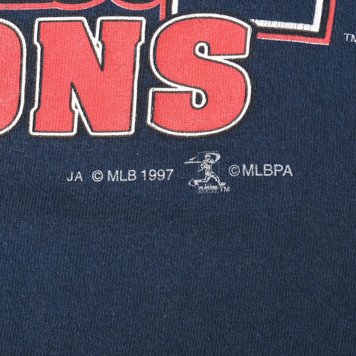 Close-up of 1997 MLB and MLBPA copyright marks beneath the front print
