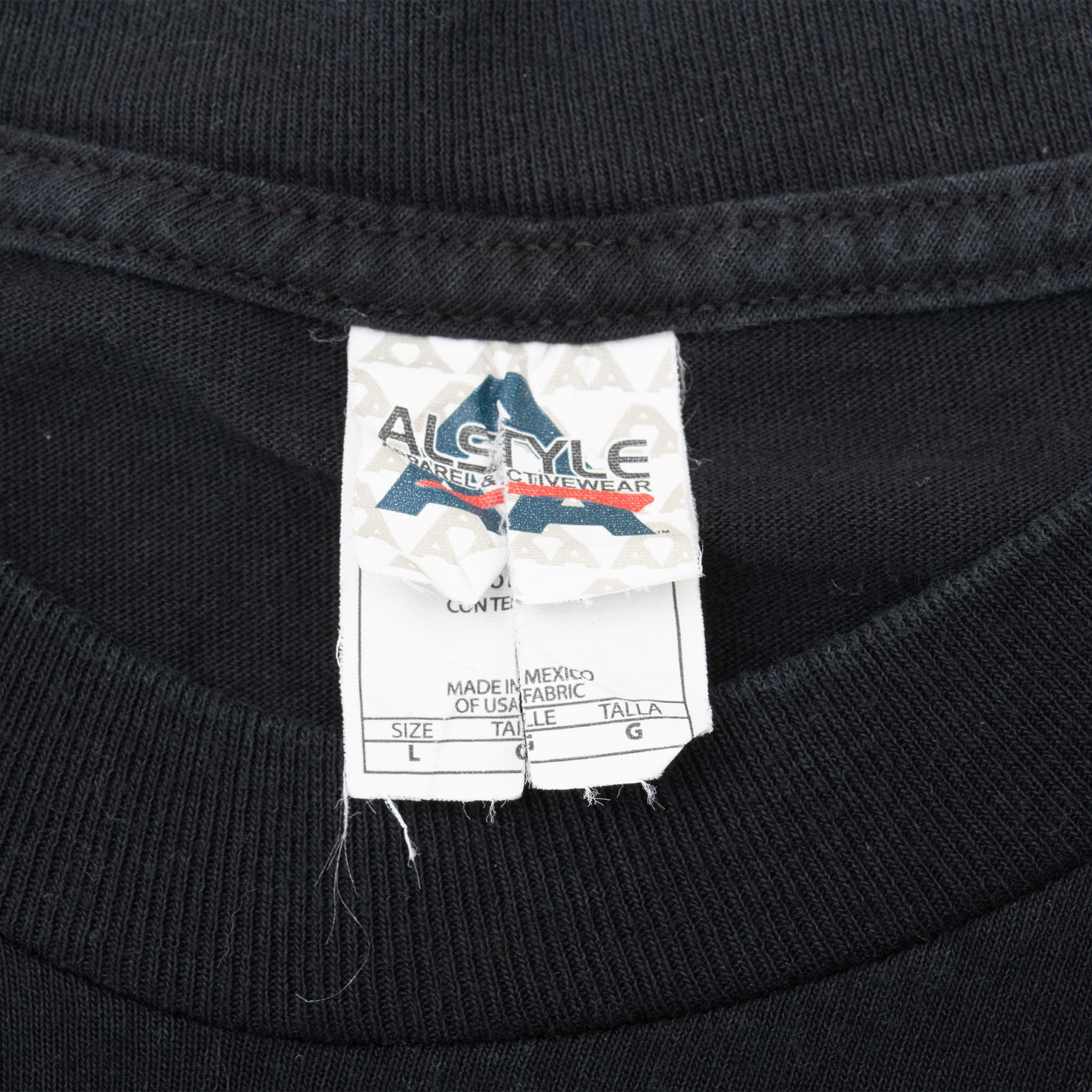 Close-up of Alstyle Apparel & Activewear neck tag marked size L