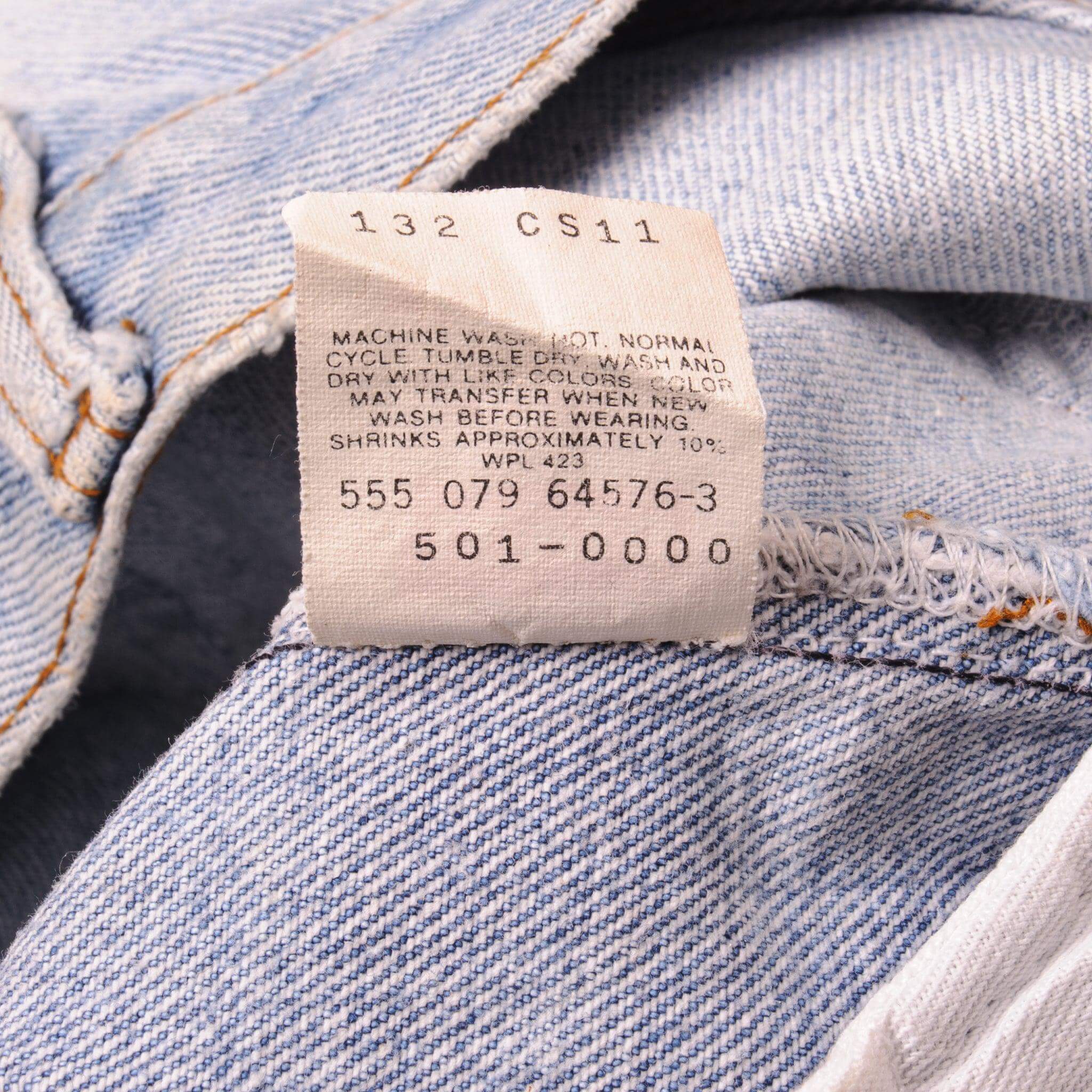 Beautiful Indigo Levis 501 Jeans Made in USA with a light blue wash and a nice contrast of light blue and very light blue. Size on Tag 28X36 ACTUAL SIZE 27X29 Back Button #555