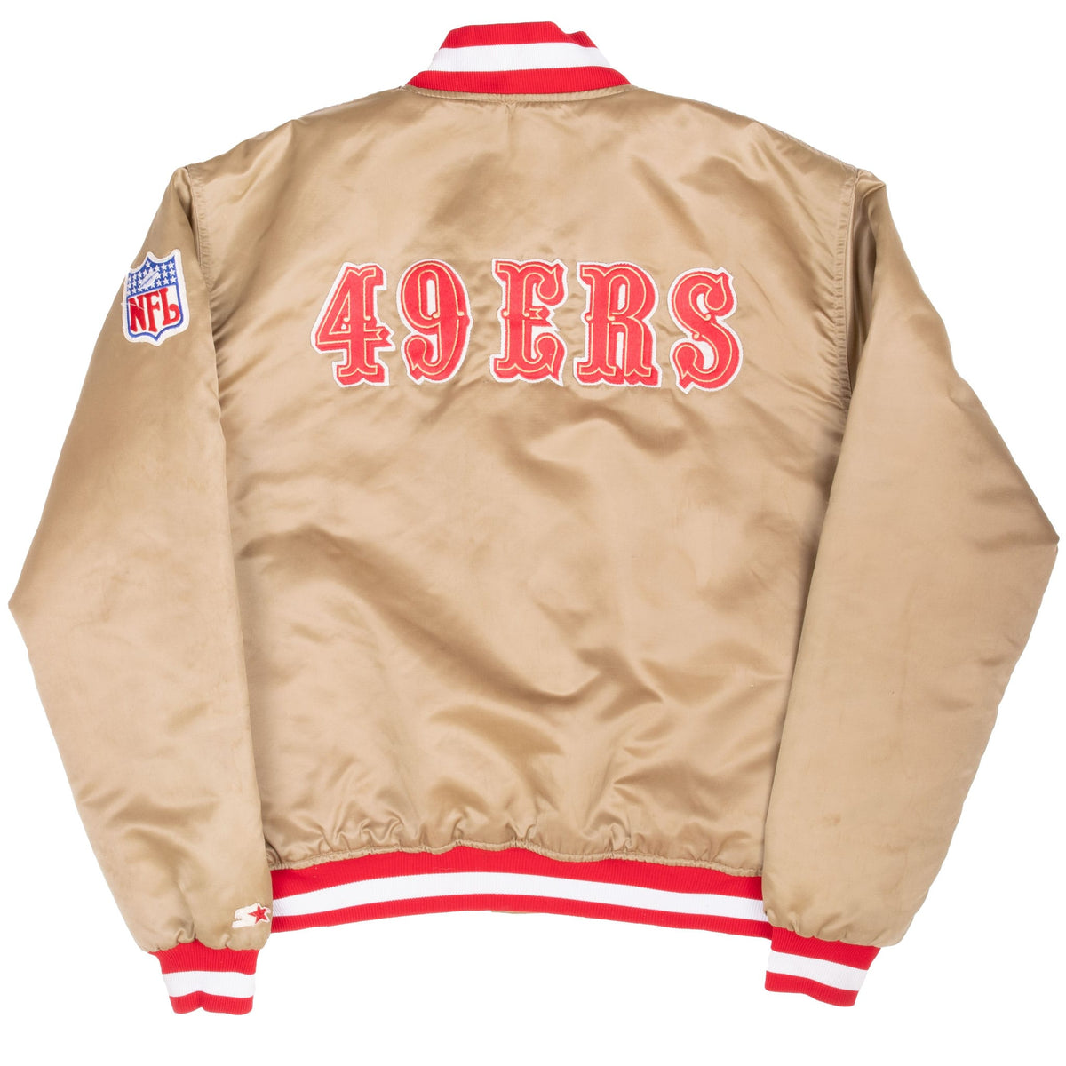 Back of gold San Francisco 49ers Starter jacket with large red 49ERS lettering