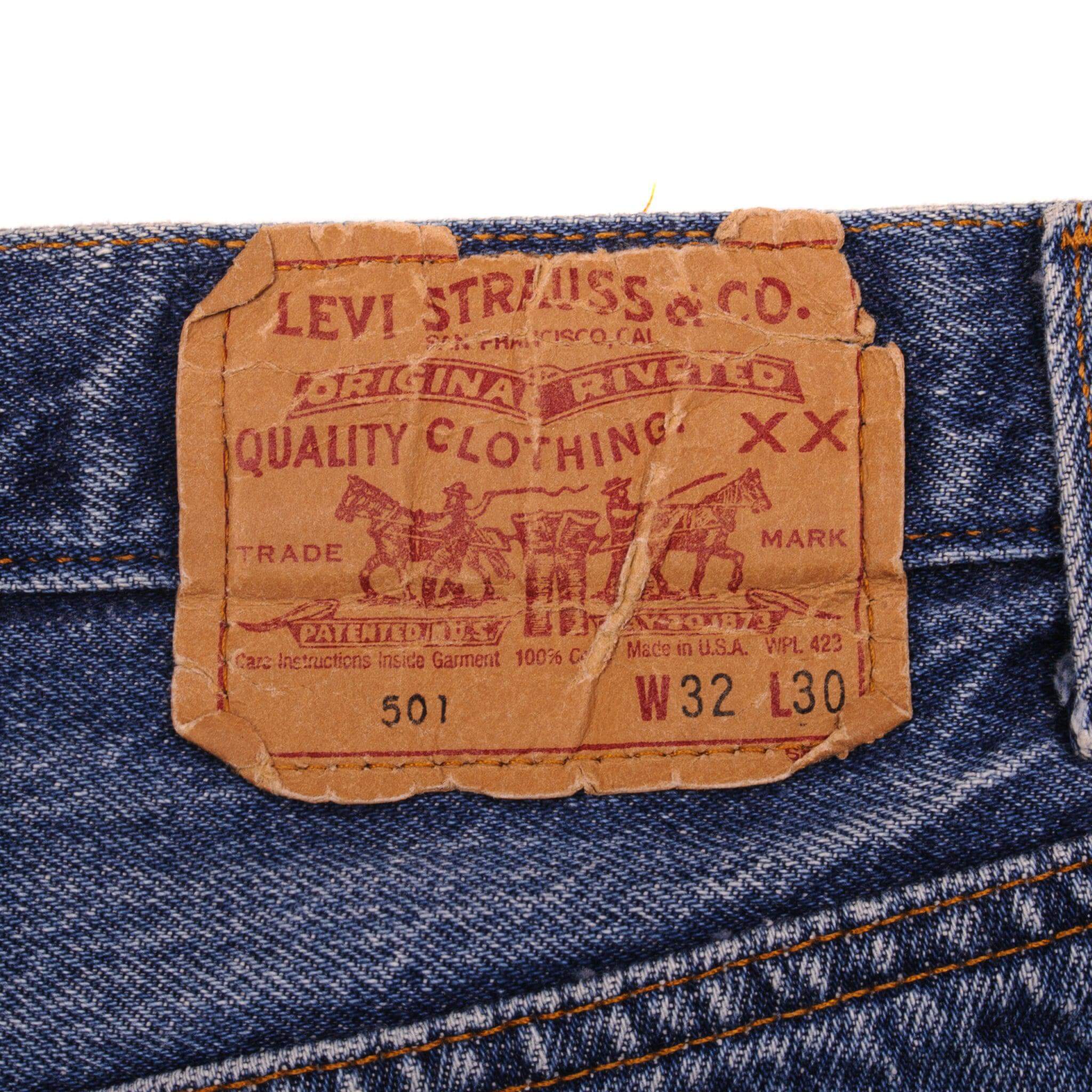 Beautiful Indigo Levis 501 Jeans Made in USA with a medium blue wash, a nice contrast of light and medium blue and some really nice whiskers. Size on Tag 32X30 ACTUAL SIZE 30X27 Back Button #552