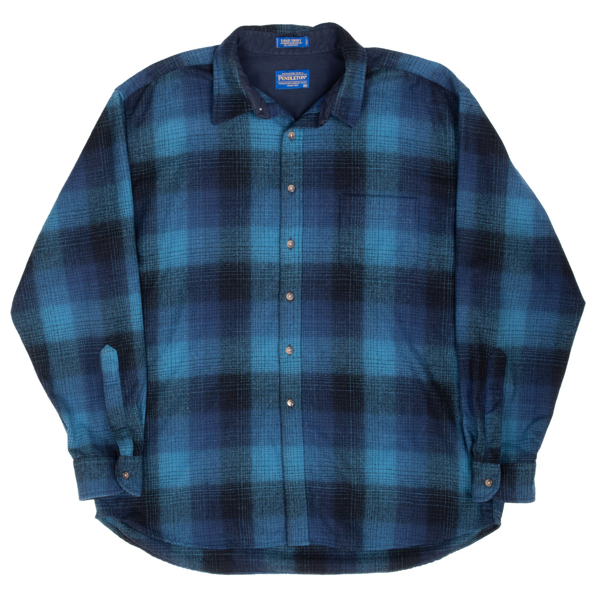 Full front view of Pendleton blue and navy plaid shirt with curved hem