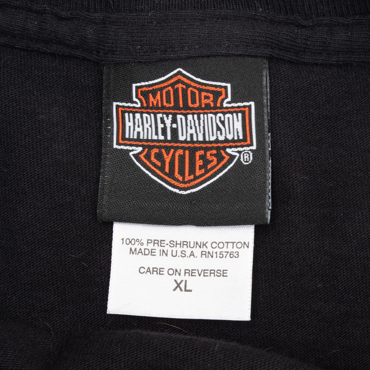 Harley-Davidson neck label and care tag marked XL, 100% pre-shrunk cotton and made in USA